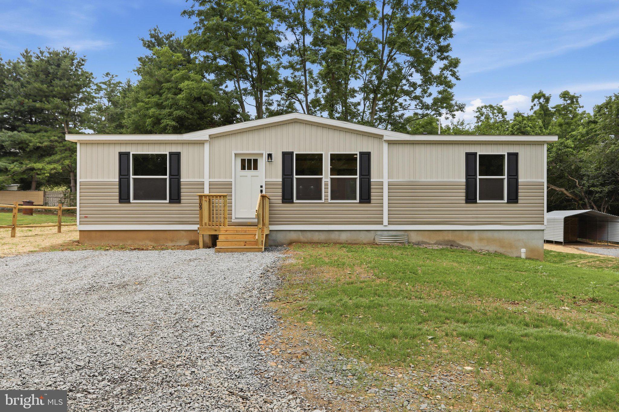 Beautiful, well-appointed and brand new! This "never lived in"  manufactured home sits on a private lot in Fayetteville with a full basement underneath! This is not a rented lot, and the title is being retired. All types of financing should be available. Buy with 0% down! (See lender to determine if you will qualify). The moment you walk in the home, you'll feel the spacious layout. This place feels solid!