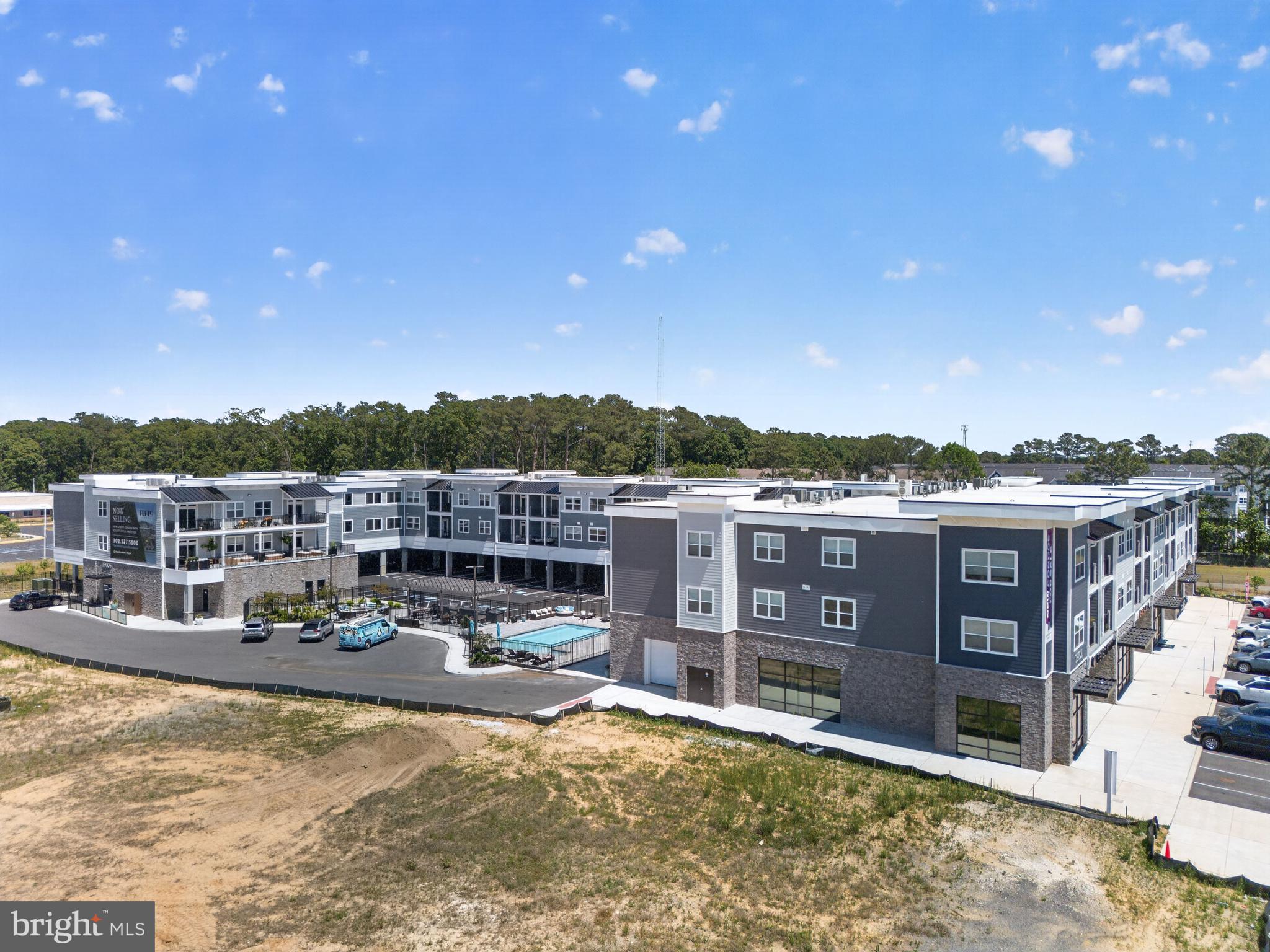 FLATS AT COASTAL STATION - Residential