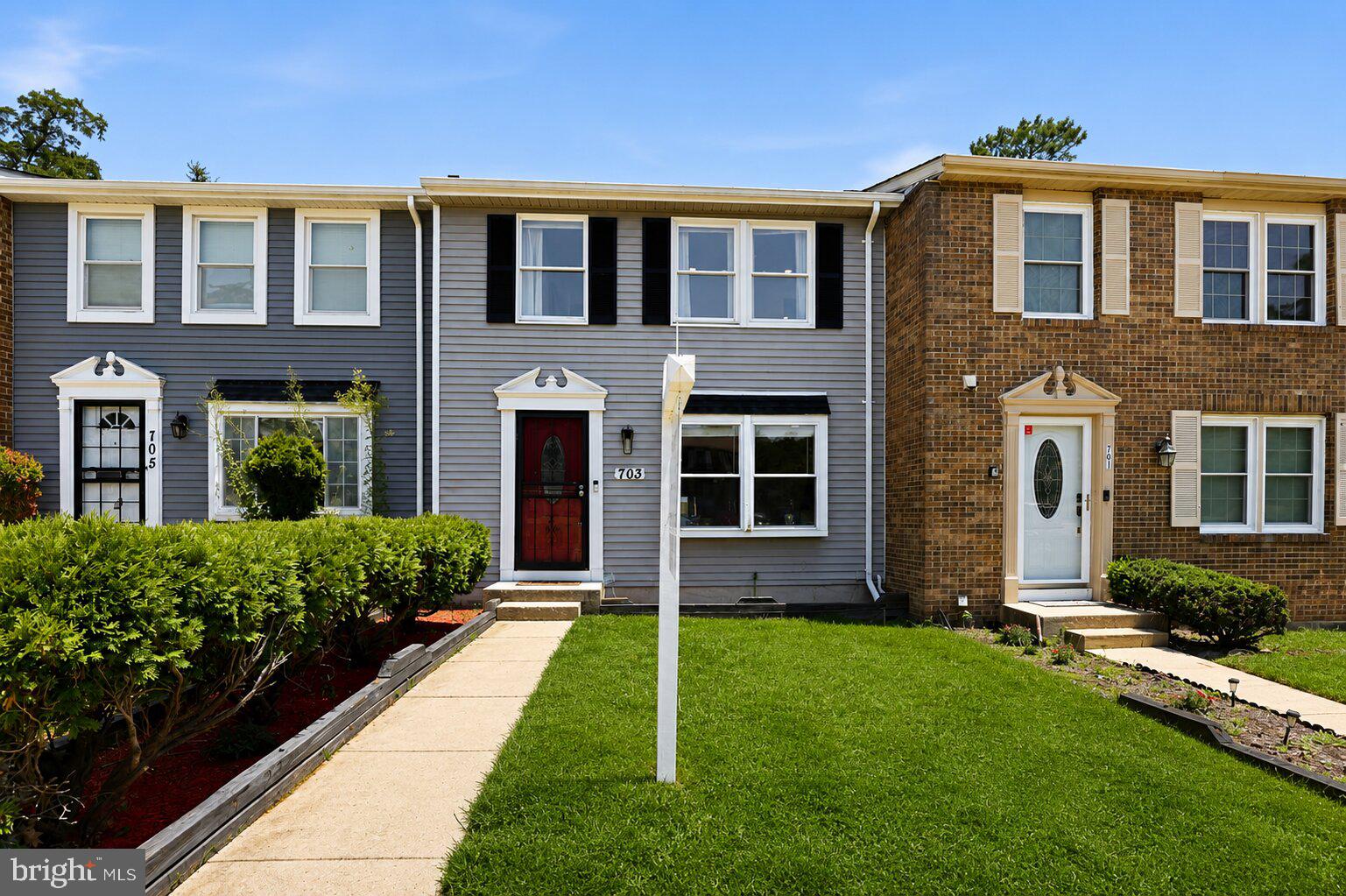 Beautifully updated and completely move-in ready, this three-level Colonial townhome offers the perfect blend of style, space, and convenience in the Willow Hills community of Landover. Featuring 4 bedrooms, 3.5 bathrooms, approximately 1,560 square feet of finished living space, and an assigned parking space, this home is designed to fit today's lifestyle.

The main level welcomes you with a bright and inviting floor plan accented by luxury vinyl plank flooring, fresh paint, crown molding, recessed lighting, and updated finishes throughout. The spacious living and dining areas flow seamlessly into the renovated kitchen, complete with stainless steel appliances, ample cabinet space, and plenty of room for everyday meals or entertaining. A stylishly updated powder room completes the main level.

Upstairs, you'll find three generously sized bedrooms, including a spacious primary suite with a walk-in closet and beautifully renovated en-suite bathroom. Two additional bedrooms share an updated full hall bath, offering comfortable accommodations for guests or a home office.

The finished lower level expands your living space with a large recreation room, a fourth bedroom, and a full bathroom—ideal for overnight guests, multigenerational living, a private office, or a fitness room.

Step outside to enjoy the rear deck, perfect for summer cookouts, morning coffee, or relaxing after a long day. Additional highlights include central air conditioning, a heat pump, updated bathrooms throughout, abundant storage, a low HOA fee of just $60 per month, and assigned parking space #254.

Ideally located just minutes from multiple Metro stations**, MARC, and Amtrak**, this home offers exceptional commuter convenience with easy access to Washington, D.C., Baltimore, the Capital Beltway, Route 50, NASA Goddard, the University of Maryland, shopping, restaurants, and everyday conveniences.

Offering four true bedrooms, three-and-a-half beautifully updated bathrooms, modern finishes throughout, and outstanding value, **703 Green Willow Place** is the turnkey home you've been waiting for.