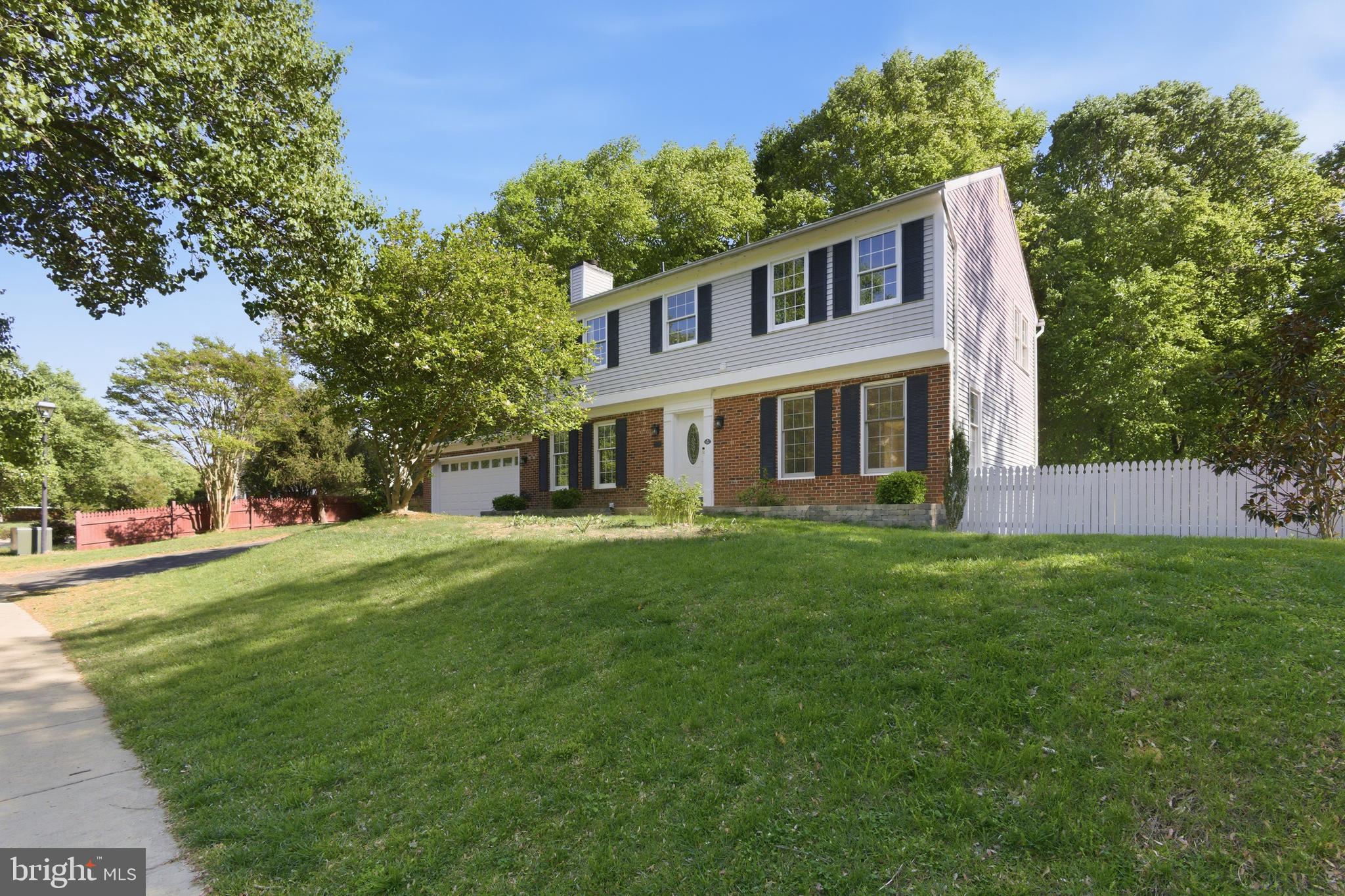 Colonial 5 bedroom, 3 1/2 bath home on .87 acres with mature trees. Quiet neighborhood just 9 miles from DC, 13 miles from Andrews, 12 miles from Alexandria. Spacious composite deck and primary bedroom balcony overlook adjacent 1,000-acre Piscataway Creek Stream Valley Park.  Optional $40/yr Piscataway Hills Citizens' Association to obtain access to private neighborhood park, fishing, canoe storage and boat launch. Fenced garden beds, chicken coop, and garden shed w/electric outlets and lights. Updated, modern kitchen with induction stove, stainless Samsung appliances and picture window with views of Piscataway Creek when leaves fall. Separate basement entrance, bedroom, and full bath allows for comfortable accommodations for guests or the ability to rent out.  Laundry hookups in the basement and upstairs in a secondary bedroom. New carpet throughout the house; bamboo flooring on the main floor, new tile floors in the basement. Two car garage with sturdy storage shelving. Plenty of storage in oversized basement laundry room.