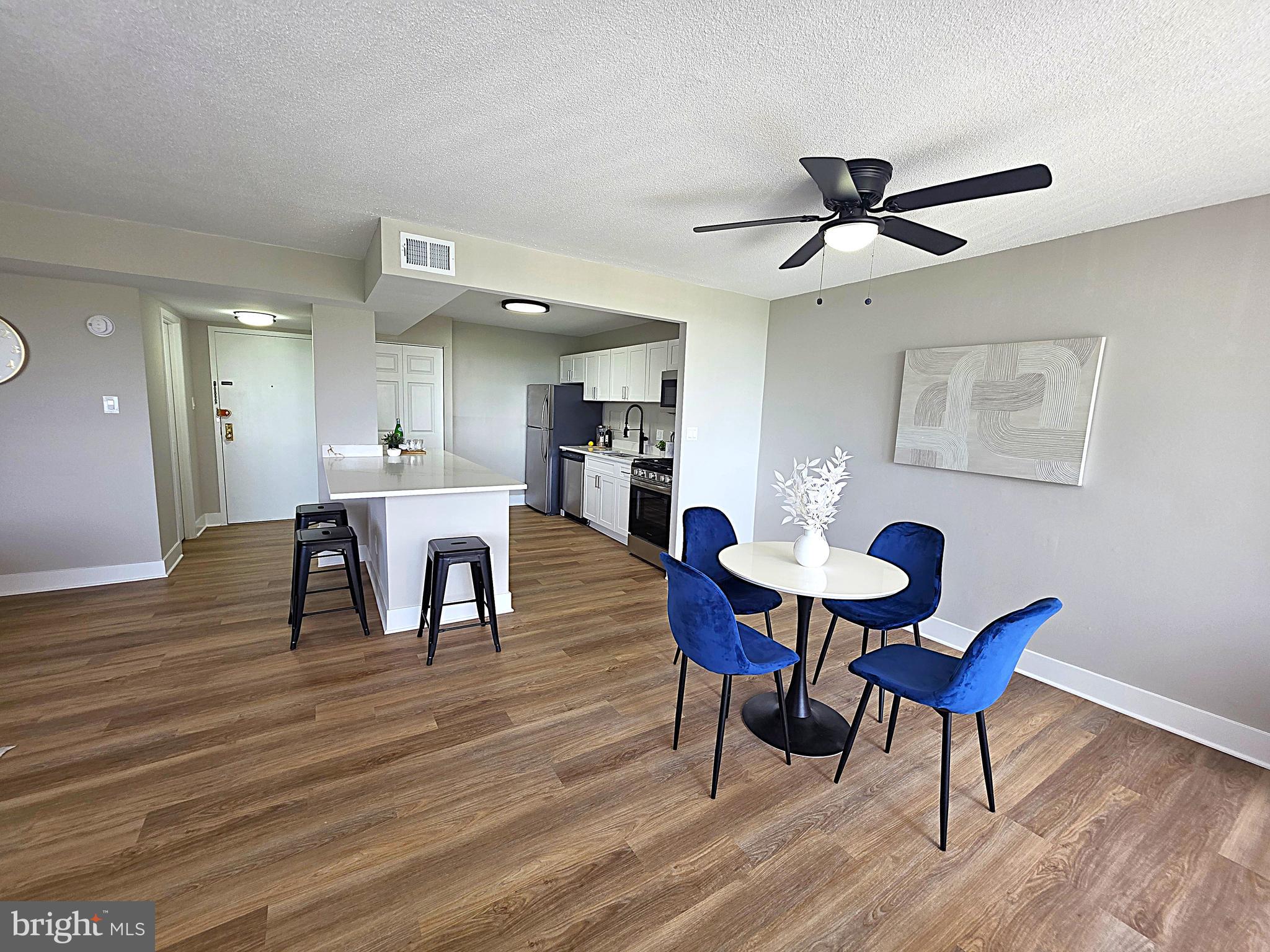 Completely renovated 1BR/1BA condo on the 7th floor of Presidential Towers with beautiful views and abundant natural light. Features brand-new hardwood floors, fresh paint, new doors, fixtures, window treatments, and a fully updated bathroom. The stunning kitchen boasts new cabinets, granite countertops with bar seating, and stainless-steel appliances. Move-in ready and beautifully transformed from top to bottom. The condo fee includes ALL UTILITIES utilities, providing exceptional value and predictable monthly expenses. Be the first to call this amazing renovation your new home!