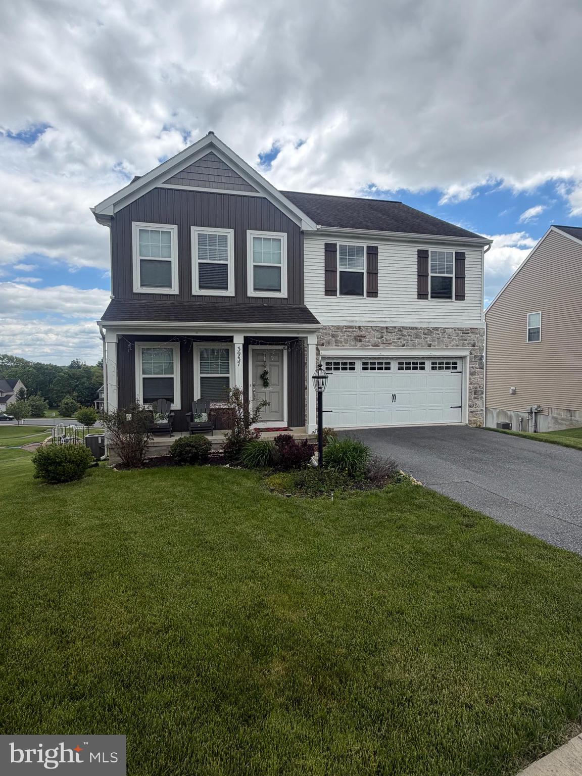 Welcome to 3937 Archer Ln — a stunning 4-bedroom, 2.5-bathroom colonial in the highly sought-after Sylvan View community of West Hempfield Township, proudly situated within the award-winning Hempfield School District, home to Hempfield Senior High School, rated 9/10 by GreatSchools.
Crafted by the renowned Garman Builders and built in 2017, this 2,849 sq ft home blends quality construction with thoughtful design. The main level welcomes you with an open, flowing floor plan featuring a spacious family room, a formal dining room, and a well-appointed kitchen boasting granite countertops, a kitchen island, built-in microwave, walk-in pantry, and rich engineered hardwood flooring — perfect for both everyday living and entertaining.
Step outside onto the deck off the kitchen and take in the serene surroundings. Whether you're hosting a summer cookout, sipping your morning coffee, or unwinding at the end of the day, the deck and outdoor living space offer a peaceful retreat with beautiful views that never get old.
The finished walkout basement adds 665 sq ft of versatile living space, filled with natural light and opening directly to the patio — ideal for a home gym, media room, playroom, or guest space.
Upstairs, all four bedrooms are conveniently located on the upper level, including the primary suite with its own private bath. Upper-level laundry makes day-to-day living a breeze. The home also features a 2-car attached garage, natural gas forced-air heating, and central air conditioning.
As an added bonus, the home is equipped with solar panels, helping offset energy costs and making this an environmentally conscious and economically smart choice.
Located just minutes from Lancaster city, major commuter routes (Route 30 and Route 283), Mountville Elementary, and all the shopping, dining, and recreation Lancaster County has to offer — with an incredibly low HOA fee of just $100/year. Refrigerator, washer, and dryer are all included.
Homes in Sylvan View move fast — don't miss your chance to call this one home!