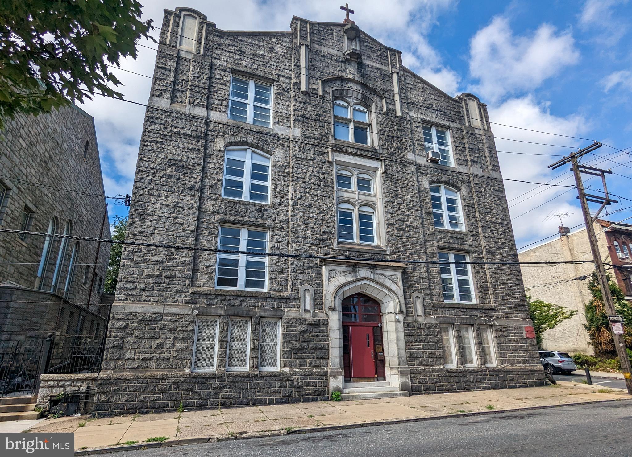 Are you in search of a one-of-a-kind investment opportunity in the thriving Tioga neighborhood of Philadelphia? Look no further than this expansive 37,183 sq ft commercial property, formerly a school and church conversion, located just off Erie Ave amidst a landscape of new construction and updated buildings. This versatile property is a true gem with endless potential for creative redevelopment.

**Property Highlights:**

**Two Distinctive Buildings:** This property boasts two separate buildings, each with its own distinct character and potential uses.

**Former School Building:**
- Four-story structure with a rich history.
- Spacious layout featuring 4-5 classrooms on each floor.
- Bathroom facilities on every floor for added convenience.
- A large, fully equipped kitchen area on one floor, perfect for communal or culinary use.
- The top floor includes a small kitchenette.
- Abundance of natural light floods in through expansive windows.
- Historic charm and architectural details that add character to the space.
- Impressive 10-foot-high ceilings provide a sense of spaciousness.

**Former Church Building (Current Gym):**
- A remarkable transformation of a historic church into a contemporary gym.
- Equipped with a modern HVAC system for year-round comfort.
- Spread over two floors, offering versatile use possibilities.
- Features two separate stages, ideal for performances, presentations, or events.
- Two full-sized basketball courts for athletic activities and events.
- A small field area in the basement provides additional flexibility.
- Possibility to create amenity space or optimize the unit count based on your vision.

**Additional Features:**
- Fenced parking lot for secure and convenient parking.
- Proximity to new construction and updated buildings enhances the investment potential.
- Ample office spaces throughout the property offer flexibility for various uses.
- An abundance of open space and historic charm provides a unique canvas for creative redevelopment.
- This property offers immense potential for conversion into residential units, taking advantage of the high ceilings and large windows.

Whether you are an investor looking for a versatile property with potential for residential conversion or a developer seeking to create a unique living space, this former school and church conversion property in Tioga offers a wealth of opportunities. Don't miss your chance to own a piece of Philadelphia's history while contributing to the neighborhood's vibrant future. Act now and turn your vision into reality!