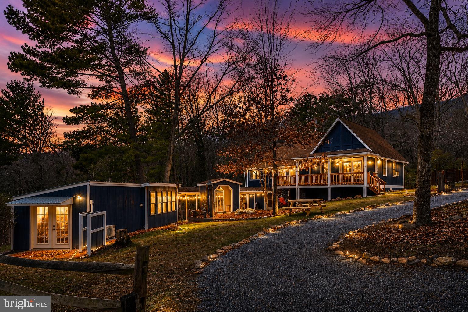 Blue Bear Cabin — Turnkey Airbnb Investment | Luray, Virginia
<p>
Yearly sales have performed as high as $100,000 in gross rental income and 291 nights booked — Blue Bear Cabin is a proven short-term rental performing at the top of its market.
<p>
Tucked into the Massanutten Forest Subdivision on a private, wooded 3-acre parcel just outside Luray, this A-frame cabin plus detached guesthouse offers the rare combination of strong financials and genuine mountain charm. All furnishings convey, making this a day-one income property with zero setup required.
<p>
The main cabin spans three levels. The main floor features soaring ceilings, an open eat-in kitchen, a remodeled full bathroom, a primary bedroom, and a generous sitting room. Upstairs, a loft holds two additional bedrooms with sweeping mountain views. The lower level adds a full bathroom, extra living space, a game room, and a bunk room — ideal for larger groups and the extended bookings that come with them. The detached guesthouse provides an additional bunk room and flexible space that could serve as an office, studio, or hobby room.
<p>
Outside, a brand-new $10,000 six-person hot tub anchors a private deck perfect for evening unwinding. A natural stream runs along the rear of the property, and the full three acres deliver the privacy and seclusion that today's vacation rental guests pay a premium for.
<p>
The owners have made significant investments in the property heading into 2025, with over $27,000 in recent capital improvements. All exterior windows were replaced in 2025 ($8,000), two new mini-split HVAC units were installed for year-round climate comfort ($9,000), and multiple exterior doors were replaced alongside a full refresh of the hot tub deck siding and stairs ($8,000). New concrete pathways replaced the existing pavers ($2,000), and both the front and back decks were freshly painted to match the exterior of the cabin. Inside, all televisions and furniture sets have been replaced with new, and the game room features arcade games (availability to be confirmed with sellers).
<p>
The property is equipped for seamless operation from day one. A Starlink satellite system ensures fast, reliable internet — essential for modern guests and remote workers — backed by a satellite dish. A $7,000 water treatment system, chest freezer, all televisions, and all furniture convey with the sale, leaving nothing for a new owner to source or install.
<p>
Location rounds out the investment case. Blue Bear sits minutes from Luray Caverns, Shenandoah National Park, the George Washington National Forest, Massanutten Resort, and Kennedy's Peak — a year-round draw for hikers, mountain bikers, and weekend escapes from the D.C. metro corridor.
<p>
Whether you're an investor looking to expand your portfolio or a buyer who wants a personal retreat that pays for itself, Blue Bear Cabin is move-in and rent-ready.