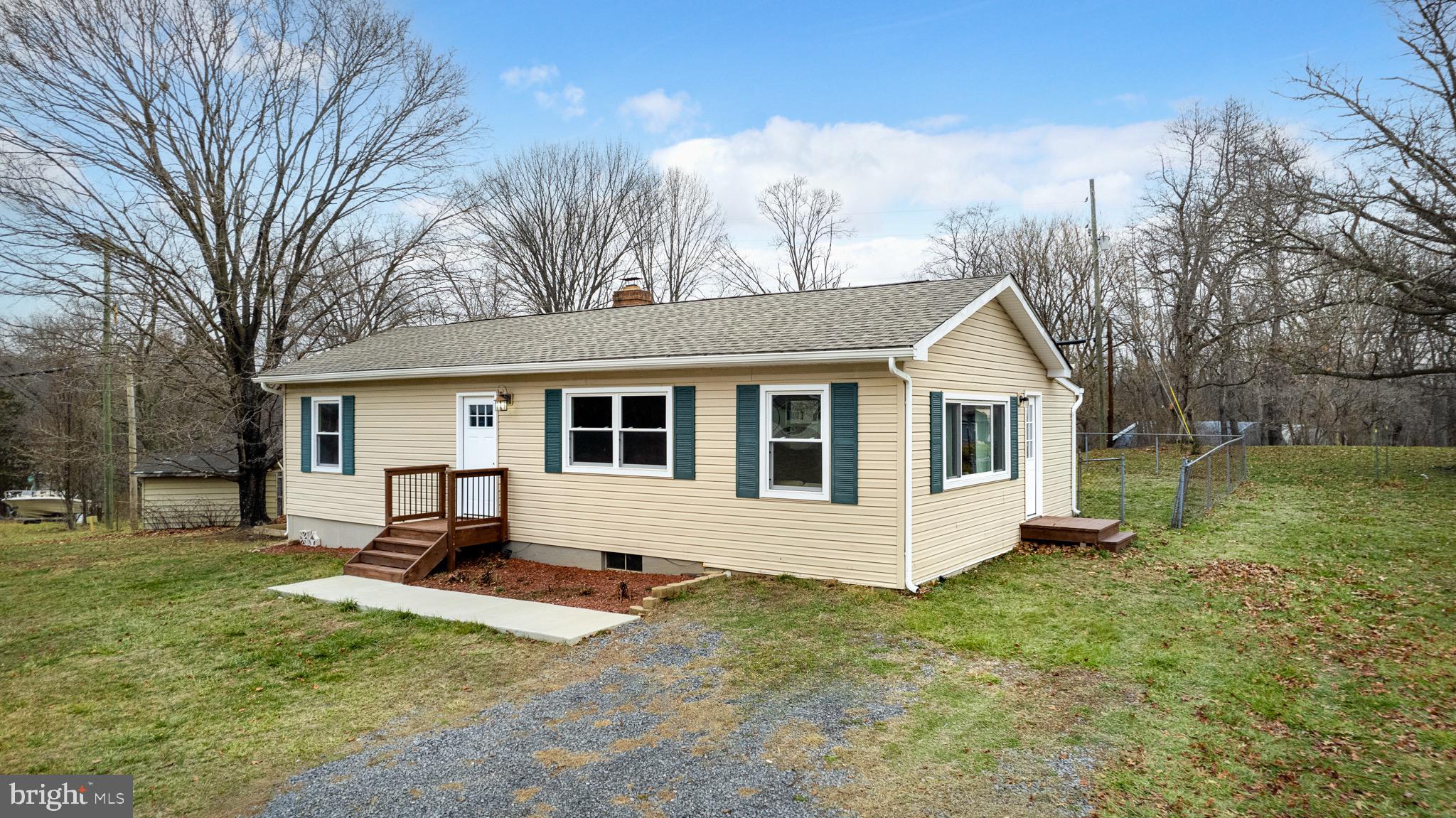 Recently Updated One Level Living Home on over an acre of land with Private River access! Upon walking into the home, you'll be greeted with a charming brick fireplace and spacious layout with plenty of natural light and room to spread out. Kitchen / Dining Combo, Living Room, Family Room and Laundry Room. 3 Bedrooms and a Fully Updated Bathroom with tiled Tub/Shower Combo. 

NO HOA, Partually Fenced in lot, and Seasonal Views of the Shenanadoah River!
Easy Access to all major commuting routes, amenties, nature, Lake Shannondale + Mountain Lake Club - the list goes on! 

Updates Include - Roof, Siding. HVAC, Electrical, Plumbing, Windows, Flooring, Bathroom, Kitchen, and more!

* Professional Photos Coming Soon!
