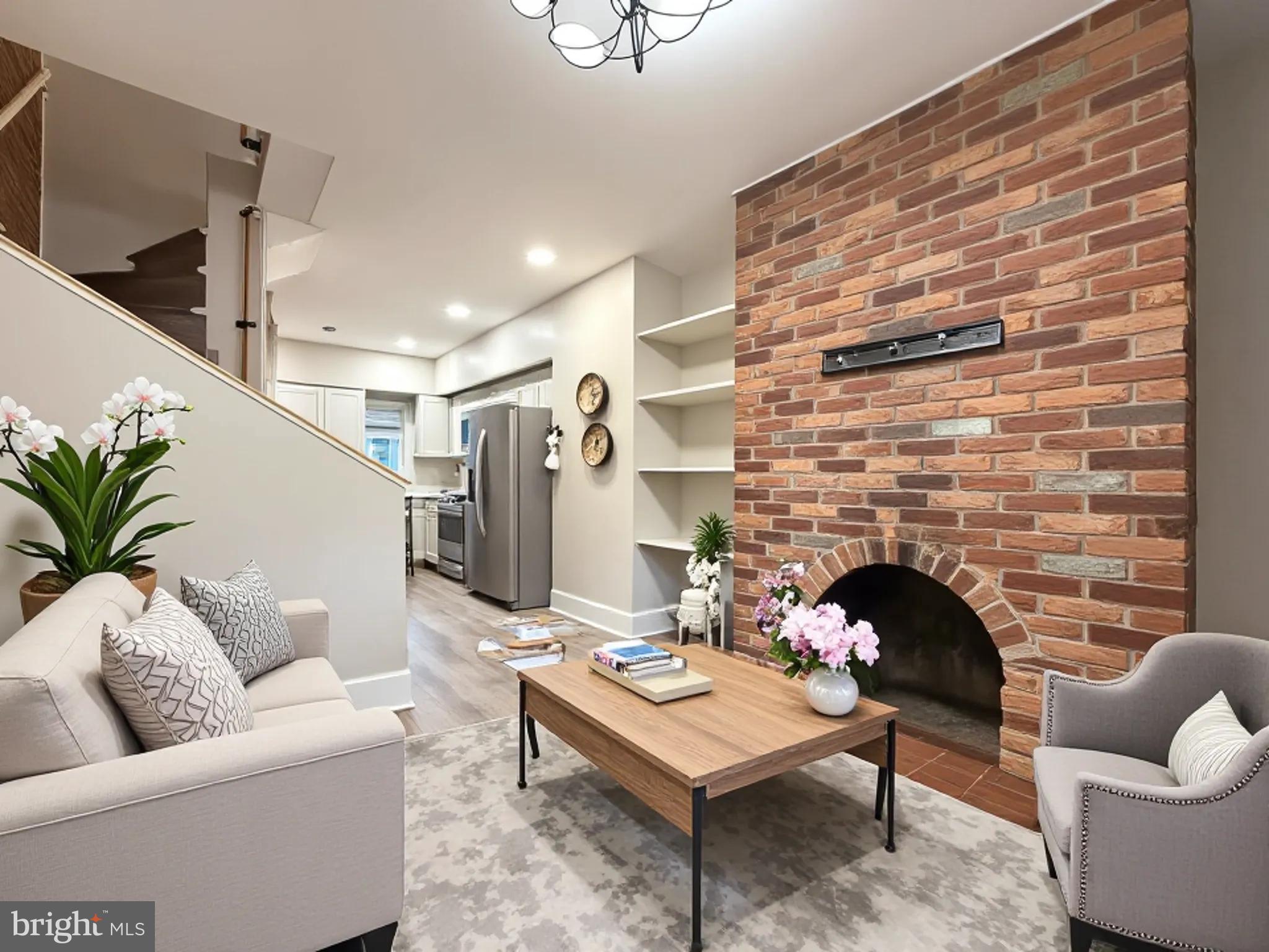 Beautifully renovated brick-front townhouse in the heart of Washington Village/Pigtown! This move-in ready home features a brand-new kitchen and beautifully updated full bath, blending modern finishes with Baltimore charm. Currently configured as a spacious one-bedroom, one-bath residence, the open-concept main level offers a bright living area, dining space, and stylish kitchen complete with stainless steel appliances, modern cabinetry, and ample workspace. Additional highlights include exposed brick, recessed lighting, new flooring, central air conditioning, forced-air heat, upper-level laundry, and an unfinished basement providing excellent storage space. Ideally located just minutes from Downtown Baltimore, the Inner Harbor, Camden Yards, M&T Bank Stadium, the University of Maryland Medical Center and BioPark, Hollins Market, Lexington Market, Cross Street Market, Federal Hill, I-95, I-295 and so much more! Whether you're searching for your first home, a low-maintenance city residence, or an investment opportunity, this turnkey property offers exceptional value in one of Baltimore's most convenient & growing neighborhoods.