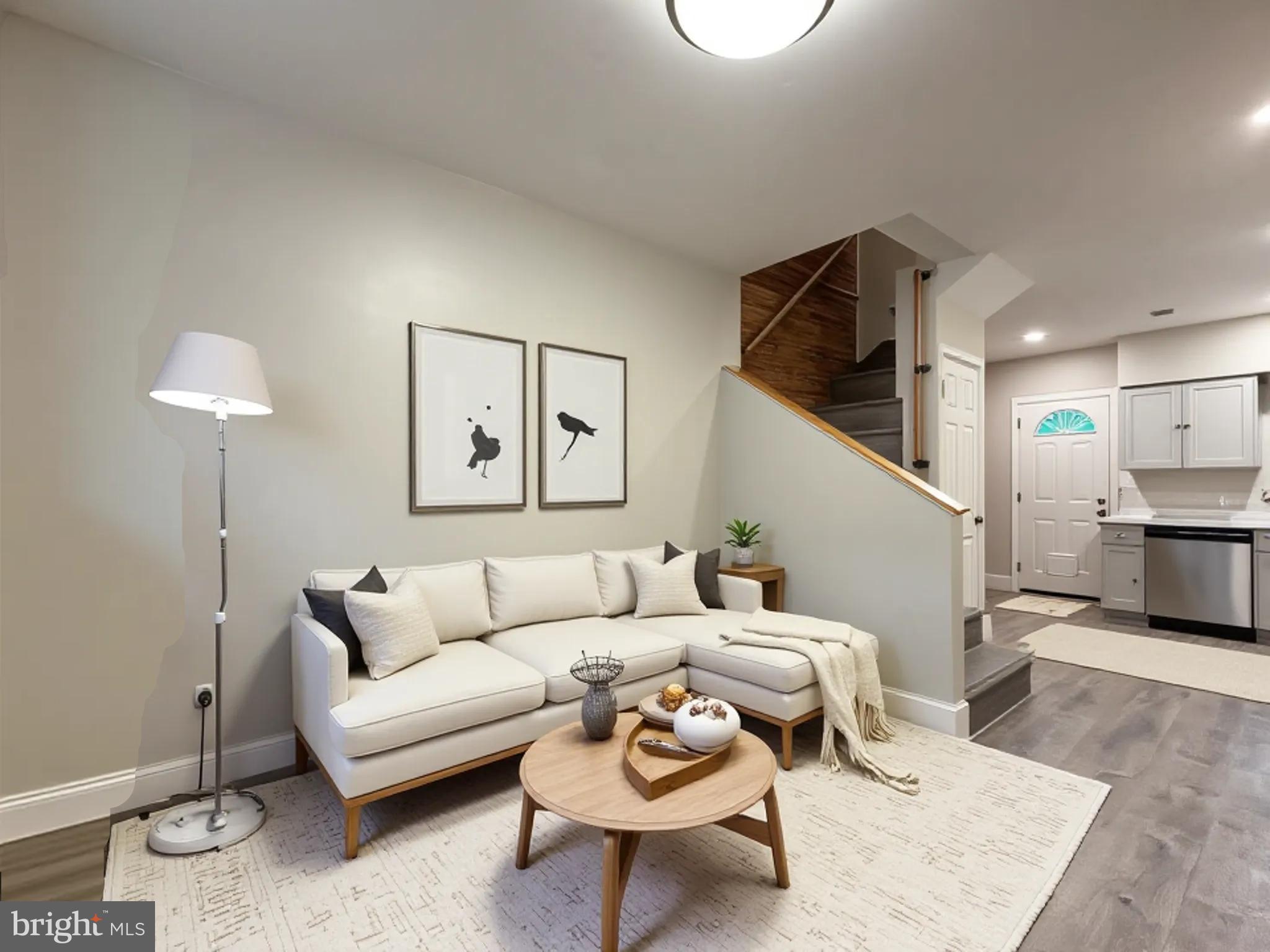 Beautifully renovated brick-front townhouse in the heart of Washington Village/Pigtown! This move-in ready home features a brand-new kitchen and beautifully updated full bath, blending modern finishes with Baltimore charm. Currently configured as a spacious one-bedroom, one-bath residence, the open-concept main level offers a bright living area, dining space, and stylish kitchen complete with stainless steel appliances, modern cabinetry, and ample workspace. Additional highlights include exposed brick, recessed lighting, new flooring, central air, forced-air heat, upper-level laundry, and an unfinished basement providing excellent storage space. Ideally located just minutes from Downtown Baltimore, the Inner Harbor, Camden Yards, M&T Bank Stadium, the University of Maryland Medical Center and BioPark, Hollins Market, Lexington Market, Cross Street Market, Federal Hill, I-95, I-295 and so much more! Whether you're searching for your first home, a low-maintenance city residence, or an investment opportunity, this turnkey property offers exceptional value in one of Baltimore's most convenient & growing neighborhoods.