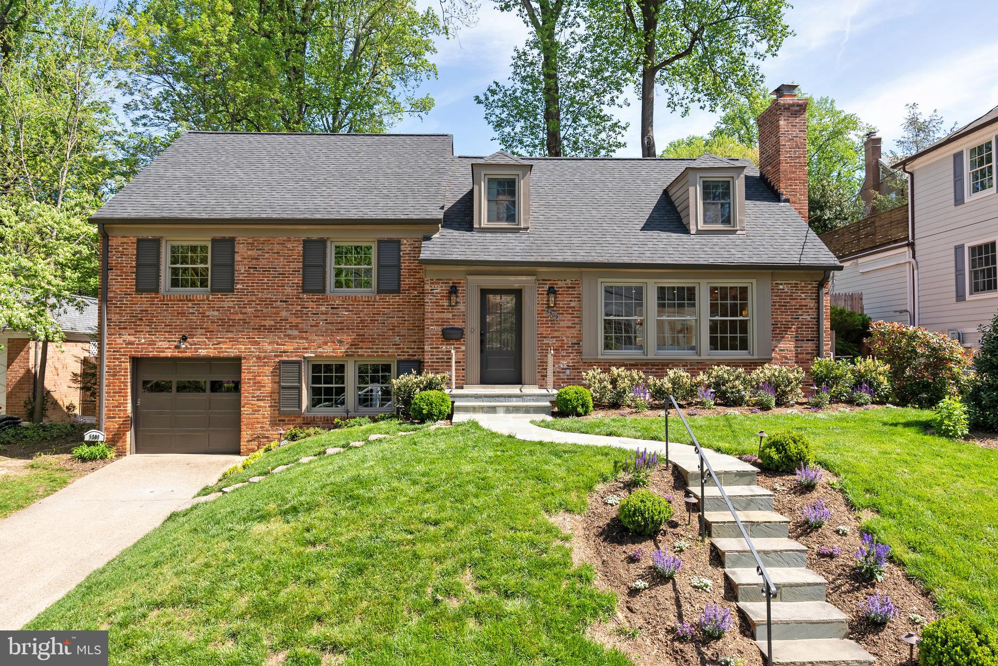Set in the heart of Westmoreland Hills, this refined residence offers five spacious bedrooms and three and a half newly renovated bathrooms in a thoughtfully designed space. The professionally landscaped lot offers privacy, beauty, and functionality -- ideal for both everyday living and effortless entertaining.

Step into the foyer to shake off the cold and rest yourself next to the cozy fireplace and large bay window. Or plan summer soirées where guests seamlessly move from the living room, to the formal dining room, out to the patio. Just off the dining room, a new flagstone patio invites outdoor gatherings, while the serene, terraced backyard (complete with a built-in outdoor fireplace), sets the stage for intimate al fresco dining or raucous barbecues. The functional kitchen serves as the heart of the home with stainless steel appliances and ample counter space. Pull up a barstool at the peninsula while reading the paper, chopping vegetables, or helping with homework.
 
Down a few steps is the den of your dreams. With warm paneling, built-ins, and an oversized bay window, this is by far the owner's favorite retreat. Access to the oversized garage, a deep coat closet, and updated powder room to provide the ultimate convenience and efficiency for everyday life.

But wait -- there's more! If overnight guests or live-in au pair need room to spread out, the newly renovated lower-level offers another brand new family room, bedroom with egress, and another full ensuite bath. The kitchenette, laundry, and additional storage make this space more than a retreat - it’s like its own separate living space.

The upper bedroom levels features four additional bedrooms including a primary suite with custom walk-in closet, updated dual vanity bathroom, and “wet room” shower with integrated freestanding tub. The walk-up attic level is poised for future finishing or easily accessible storage.

All systems have been recently upgraded including windows (2023), HVAC (circa 2017), second HVAC (2024), new water heater, roof (circa 2017), and insulation in attic voids surrounding the primary suite. Newly installed flooring in kitchen and lower level, freshly refinished hardwoods throughout, renovated baths, and updated fixtures and finishes make this property a turn-key home.

Westmoreland Hills is known for its classic Colonial-style homes set along winding, tree-lined streets. The neighborhood borders the Capital Crescent Trail and Westmoreland Hills Park, both are just steps from the front door. Quick access to Friendship Heights, downtown Bethesda, and the vibrant shops and restaurants that define the area. Residents enjoy an active neighborhood association, beloved annual traditions, and a community feel that’s rare to find.
 
Served by Westbrook Elementary, Westland Middle School, and Bethesda-Chevy Chase High School, 5309 Falmouth Road is one for the ages.