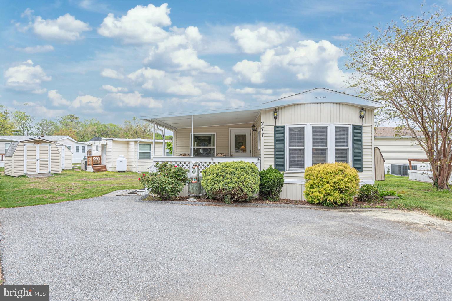 White Horse Park is one of the Best Little Communities right off the Saint Martins River, six miles from Ocean City.
This 2 bedroom 1 bath Coastal Getaway is the perfect beach retreat, you'll love some of the Vintage Wallpaper, not to mention the hard to find Built-in Bunkbeds, there is  plenty of room for everyone with the pull out couches in the oversized living room, it has an updated roof, heat pump, paved drive way, and vinyl windows through out. One of the nicest yards in the community, feels like a double lot, the front covered porch is perfect for enjoying your morning coffee or relaxing after a long day of beach or boating activities.
This place is turn key and ready to go! Bar-B-Q Grill and Bicycles are waiting in the shed. You will enjoy access to  the Marina, Pool, Kayak-Canoe Racks, Clubhouse, Play Ground,  Picnic Tables, Community Grills. Boat Slips and Boat Storage are also available.