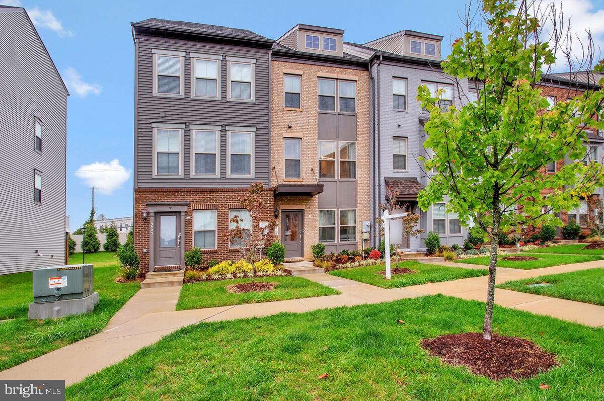 Welcome home to this stunning, like-new four-level townhouse in the highly sought-after Capital Court community! 

Step inside to discover a thoughtfully designed layout, starting with a versatile entry-level rec room—perfect for a home office or additional entertainment space. This level also features an attached rear-loading garage for added convenience.

On the main level, enjoy an open and modern floor plan highlighted by a 9-foot center island—ideal for gathering, cooking, and entertaining. Step out onto your deck to enjoy morning coffee or evening relaxation.

The third level boasts two spacious bedrooms and two full bathrooms, while the fourth level offers a private retreat with a third bedroom and an en-suite full bathroom—perfect for guests or additional living space.

Located just a short 15-minute walk to the Metro and University of Maryland Capital Region Hospital, this home offers unmatched convenience with easy access to the Beltway, nearby shopping, and the vibrant Woodmore Towne Centre just minutes away.

Don’t miss this incredible opportunity that combines style, space, and location! Schedule your showing today!