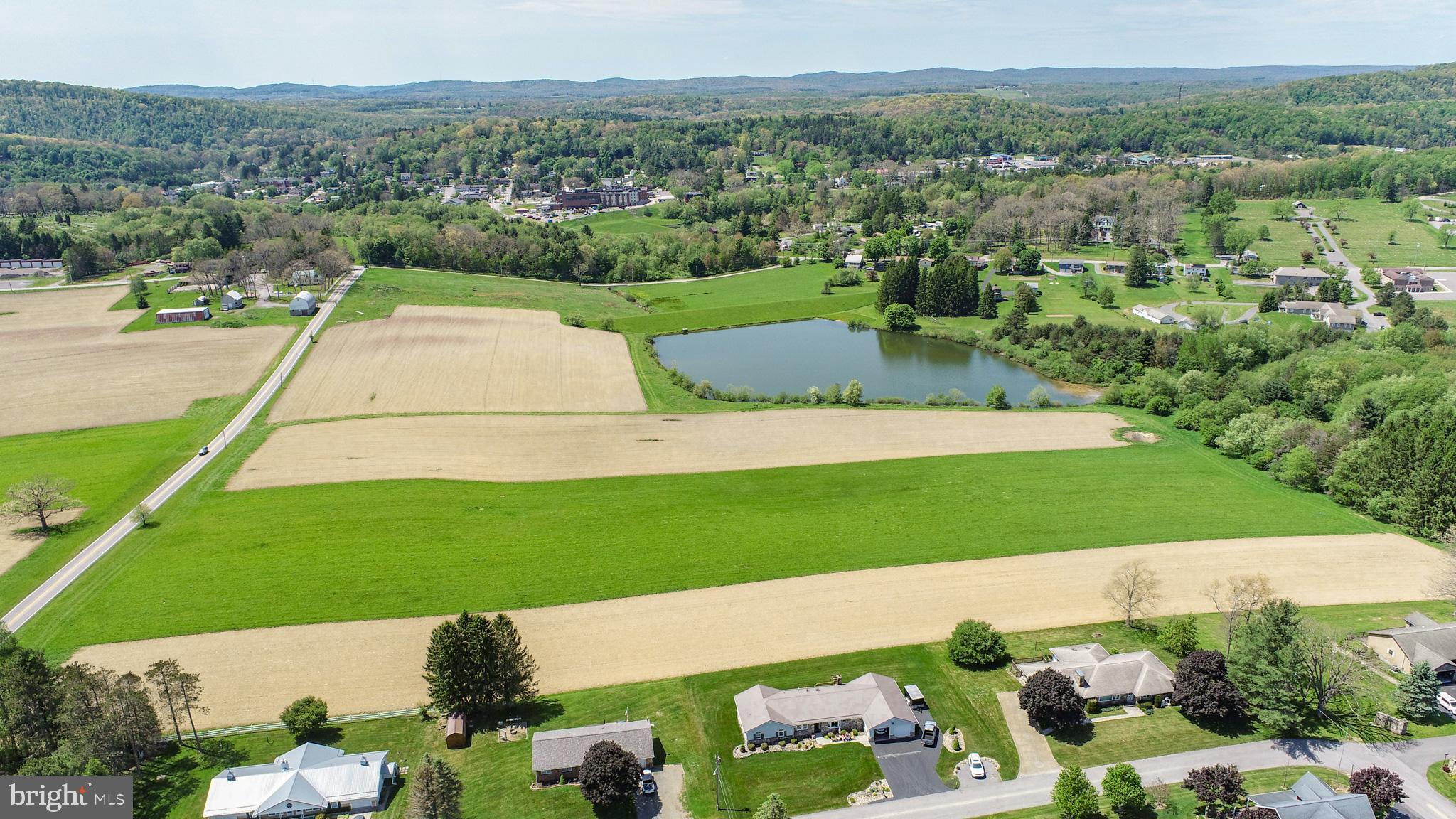 9.75 acres of prime land in a highly convenient Oakland location! This versatile property offers outstanding potential for development or the ideal setting for a private estate-sized homesite. Seller has already completed a proposed subdivision engineering plan, providing added value and future possibilities. Public water and sewer taps available per Oakland Town Administrator. Gently rolling terrain with open meadow views creates a beautiful setting while still being just minutes from schools, shopping, dining, and WVU Regional Medical Center. A rare opportunity to invest, develop, or build your dream home in the heart of Garrett County!