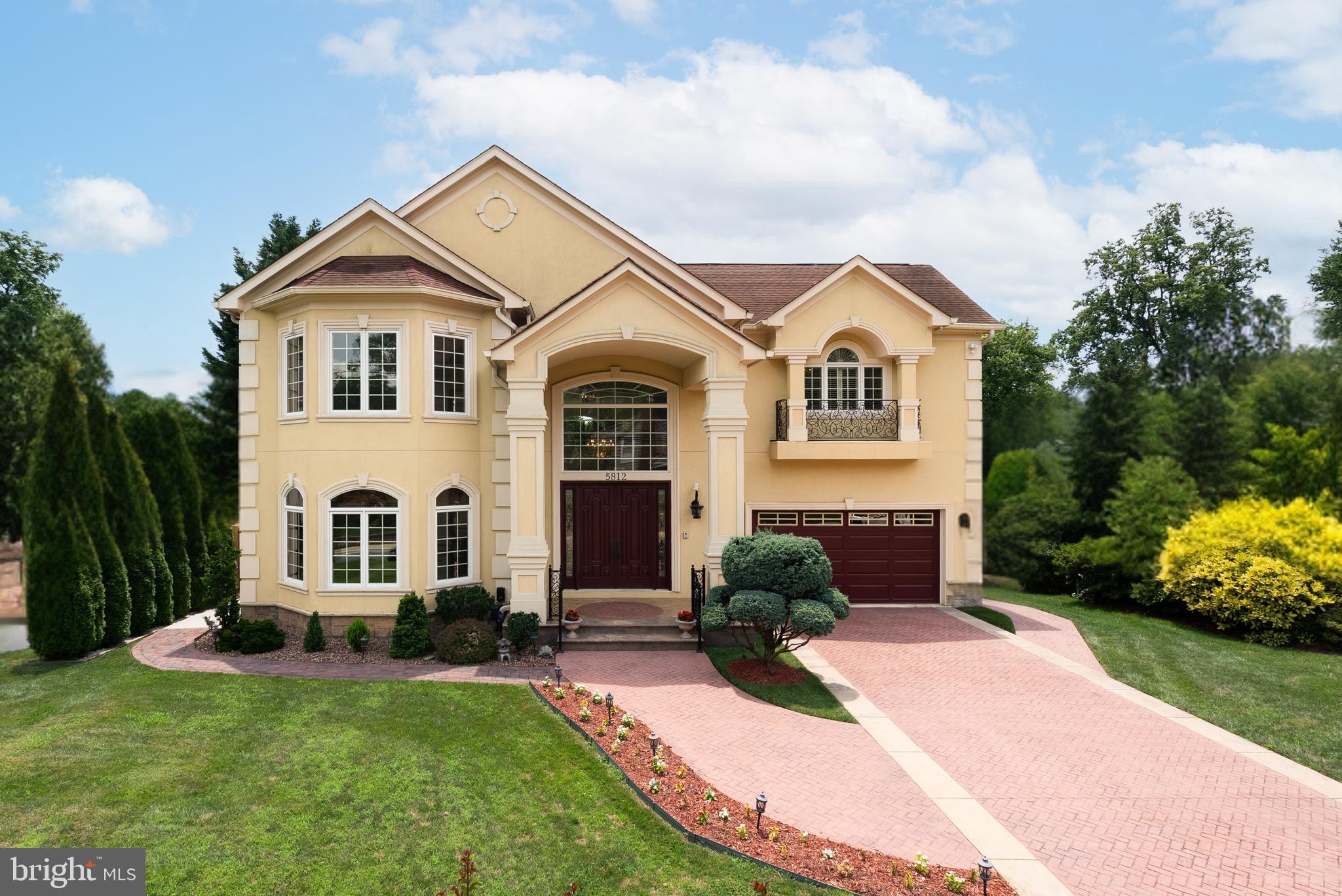 Villa Fior di Verdura is tucked privately on 0.35 of an acre at the serene eastern end of Lone Oak Drive, where the street quietly ends and 14-acre Fleming Park begins. 
6 bedrooms | 5 full baths | 3 half baths | 12,000+ square feet I ELEVATOR I IN-LAW Apartment I 3 kitchens I 4 Fireplaces
Yes, the map will show “Lone Oak,” but ignore the well-known west side. Turn east instead, slip past the traffic, and Lone Oak suddenly becomes a hushed, tree-lined lane that ends in 14 acres of county park—tennis courts, playground, ball fields, pavilion, and direct access to the North Bethesda Trail. That’s where you’ll find the herringbone brick drive and stucco façade waiting for you. This is the hidden side of Lone Oak most people never discover.
From the moment those arched windows catch the light, you know you’re not looking at another new-build box. This is a house with soul—built for someone who still believes in craftsmanship, warmth, and rooms that feel like they’ve always belonged to you.
Step inside and the two-story foyer stops you in your tracks. Hand-laid Italian tile underfoot, a wrought-iron staircase that looks like it grew there with its vines and blossoms, and sunlight pouring down from above. The family room rises the full two stories on the other side of the house, anchored by a massive stone fireplace you’ll actually want to sit in front of on a winter night.
Everything flows. The kitchen was clearly designed by someone who cooks and entertains, big enough for a crowd, thoughtful enough for two people and a bottle of wine. There’s a proper 2nd/CATERING kitchen hidden behind it, a walk-in pantry kitchen, a breakfast room that feels like its own greenhouse, and a deck that runs the length of the back of the house. A discreet secondary staircase sweeps up from the kitchen area so you can come and go without crossing the main rooms. And because guests shouldn’t have to climb stairs to find a powder room, there are two beautifully done ones on the main level. 
And because not every day is perfect, there’s an ELEVATOR that glides quietly to all three levels and a main-floor bedroom for guests (or for you, when stairs sound like too much work). 
Upstairs, the owner’s suite is the kind of retreat people spend their whole lives trying to create: its own fireplace, private gym, dual walk-in closets large enough to get lost in, and a spa bath with separate vanities, whirlpool tub, huge shower, redwood sauna, and, because some arguments should never happen over one bathroom, two private water closets.
The walk-out lower level gives you a recreation room with the fourth fireplace, gym space, storage that actually holds everything, and a true in-law or au pair residence: spacious living/dining room, full kitchen, bedroom, bath, private patio, and its own HVAC zone so everyone stays comfortable on their own terms.
Outside, the gardens are the stuff of magazine covers, stone-framed potager and cutting beds lit at night like a private villa, yet there’s still an expansive, perfectly flat lawn with more than enough room to add an Olympic-length pool and still keep the feeling of an Italian estate (the current owners left it open on purpose for exactly that reason).
And the location? A lifestyle unmatched anywhere else in the DMV. Minutes to Wildwood Shopping Center, Pike & Rose, Downtown Bethesda, and NIH. Hop on 270 or 495 in under five. The area’s top public and private schools are practically around the corner. Ten minutes to Woodmont, Bethesda, Kenwood, or Congressional. Tyson’s Galleria, Georgetown, and four major airports are all within 30–45 minutes.
This isn’t the house you settle for.
This is the one you’ve been waiting for your entire life.
Private showings only. When you see it, you’ll understand why.