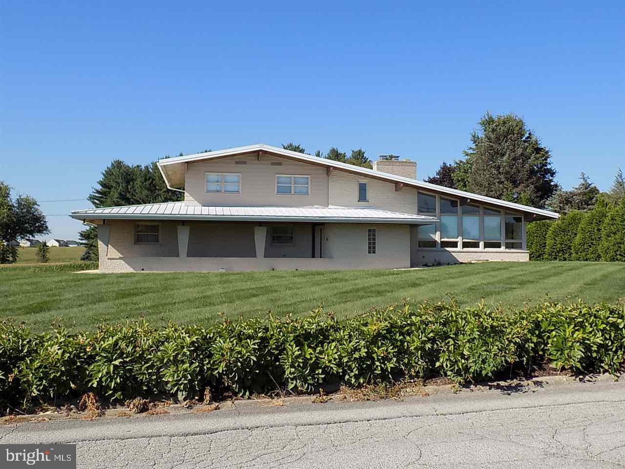 Beautiful and unique is this two story split level contemporary home located in Donwood Estates. Bring your decorating ideas. This home boasts 4 bedrooms with a lot of storage. Nice patio in back yard and plenty of privacy.  Two car garage, fireplace in living room. Built-in cabinets in dining area. Don't miss this one!