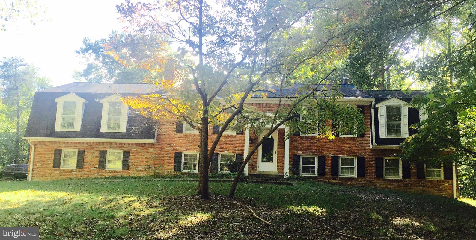 Active Pending Release** Sprawling 5.5 acres with subdividing potential & spacious home featuring 2 fireplaces, large family room, formal living and dining rooms, huge den with fireplace in basement and lots more space for storage or expansion. Home has an old in-ground pool (in need of rehab or can be taken out) and large deck off upper level. Endless potential & perfect location!