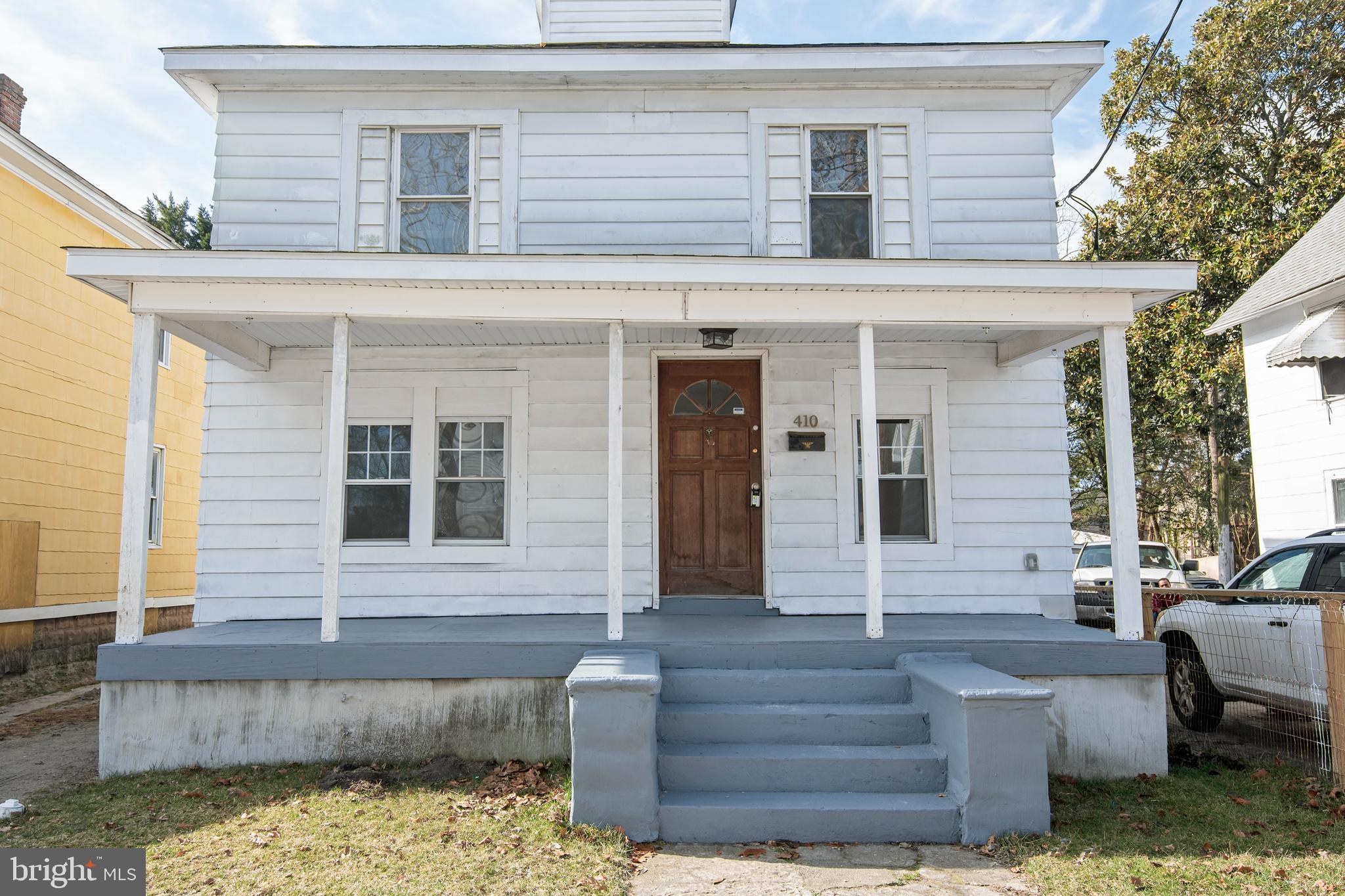 Welcome to 410 Elizabeth Street -- a move-in ready home offering comfort, flexibility, and investment potential. Freshly painted throughout, this 4-bedroom, 2-bath home features thoughtful updates including brand new carpet in the family room, staircase, and throughout the upper-level bedrooms. The main level offers a spacious entry room, family room, dining room, and kitchen, along with a full bathroom that conveniently includes laundry. A fourth bedroom on the main floor provides excellent flexibility and could easily serve as a home office, den, or guest room. Upstairs, you’ll find three additional bedrooms with new carpeting and a second full bathroom, creating a functional layout with ample living space. The unfinished basement provides plenty of additional storage space. Enjoy relaxing on the freshly painted front porch or step out onto the rear deck overlooking the backyard. A private driveway provides convenient off-street parking and access to the backyard. Previously used as a consistent rental property, this home may present a great opportunity for investors looking to expand their portfolio, while also offering an excellent option for buyers seeking an affordable primary residence with space and flexibility.