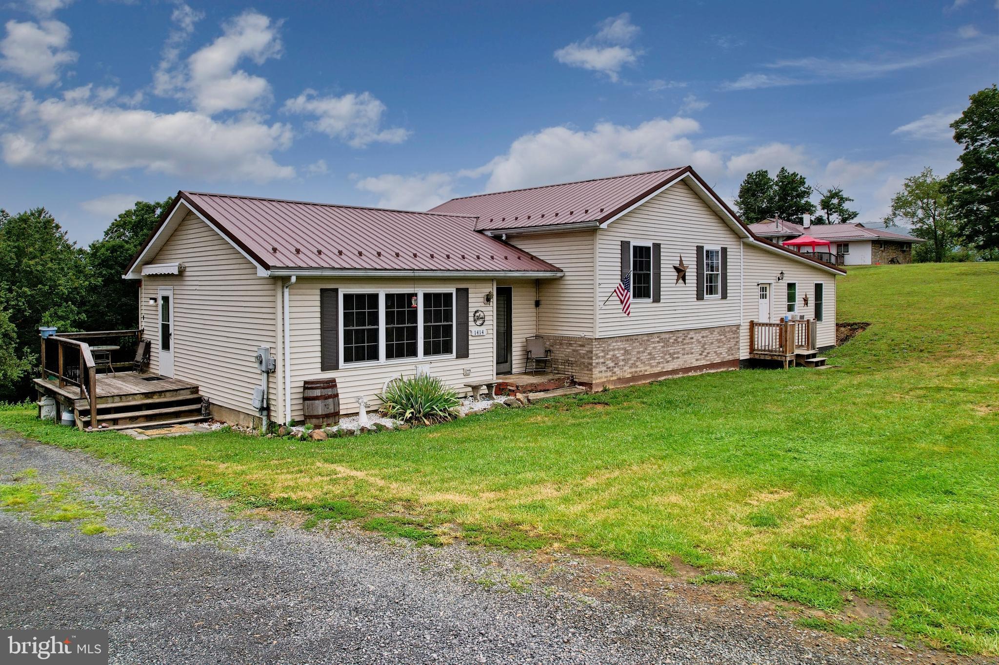 Escape to the peace and beauty of country living with this spacious 5+ bedroom, 2.5-bath home situated on just over 3 acres of partially wooded land. Enjoy breathtaking mountain views, a large yard perfect for outdoor activities, gardening, or entertaining, and plenty of room to roam.

Inside, you'll find generous living space with all kitchen appliances conveying, making your move even easier. The full basement offers additional space that can be finished to create a recreation room, home office, guest suite, or whatever best fits your lifestyle.

Conveniently located just minutes from shopping, dining, and everyday amenities, this property offers the perfect blend of privacy, scenic surroundings, and accessibility. If you've been looking for a home with room to grow, both inside and out, this country retreat is one you won't want to miss!