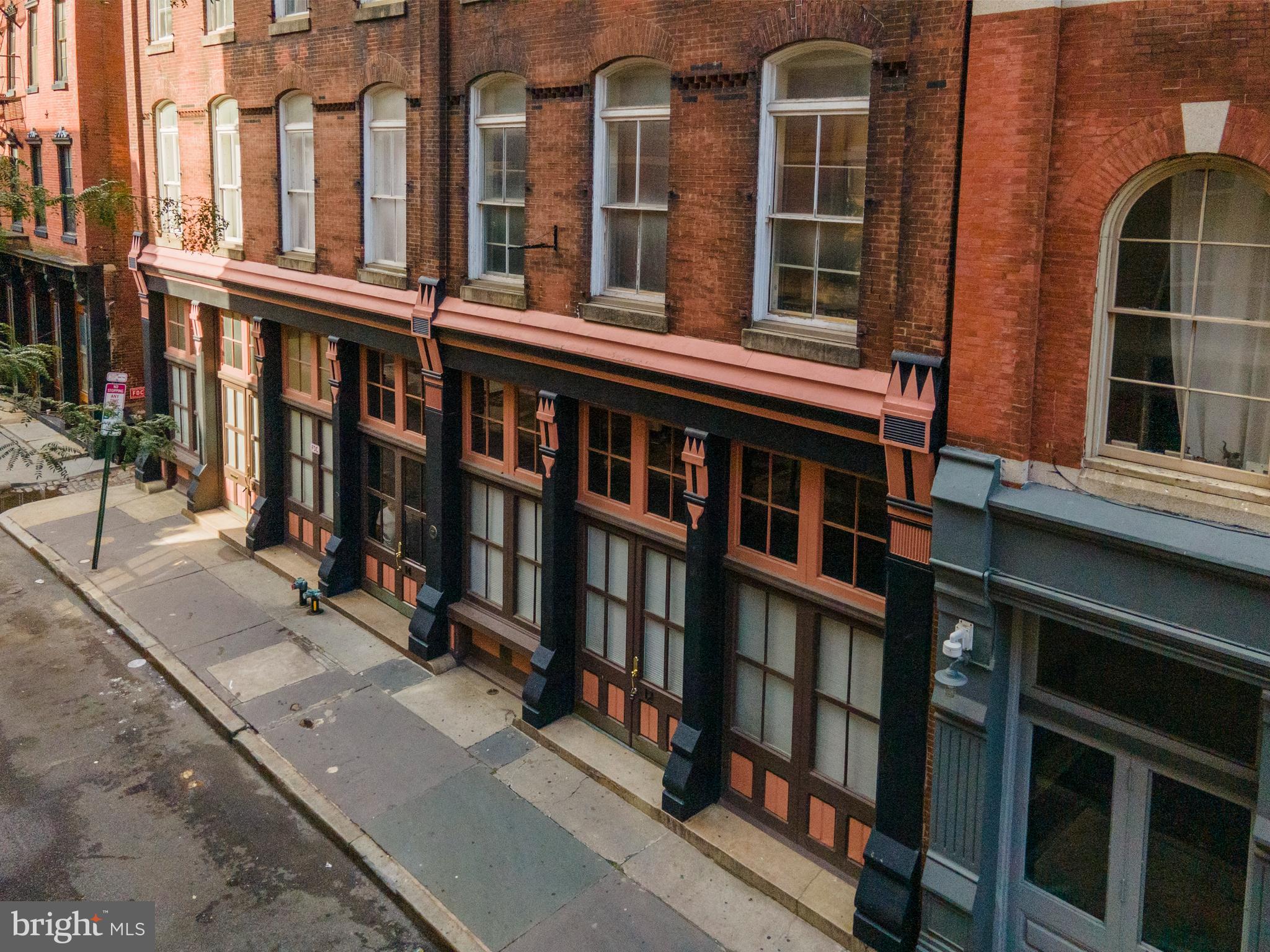Black Horse Alley is a boutique condominium community of only twenty-five uniquely appointed units. This residential conversion of a historic building is nestled on a quiet side-street just off the hustle and bustle of Old City’s Penn’s Landing and Market Streets. Just steps from cafes, coffee shops, renown restaurants, art galleries, boutiques and museums. Conveniently located close to public transit with easy access to I-95, Ben Franklin Bridge & Philadelphia Airport. The modern, secure lobby provides elevator access directly to the roof deck. Unit 103, a ground floor loft, boast exceptionally high ceilings and oversized windows inviting natural light. Original architectural details pair beautifully with top-of-the-line stainless steel appliances, granite countertops and hardwood floors. All units have access to the common roof deck allowing residents and guest exception views of historic Old City and the Philly skyline.