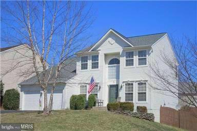 Lovely Colonial in desirable neighborhood.  Open floor plan, neutral paint. newly replaced carpet, large master suite with spacious master bath, soaker tub, dual vanity!  Great deck with fully fenced yard and play set! Fully finished basement rec room, media room, full bath w/ ceramic tile, bar area w/ granite & wine cooler.  Close to schools, I-95, public library!