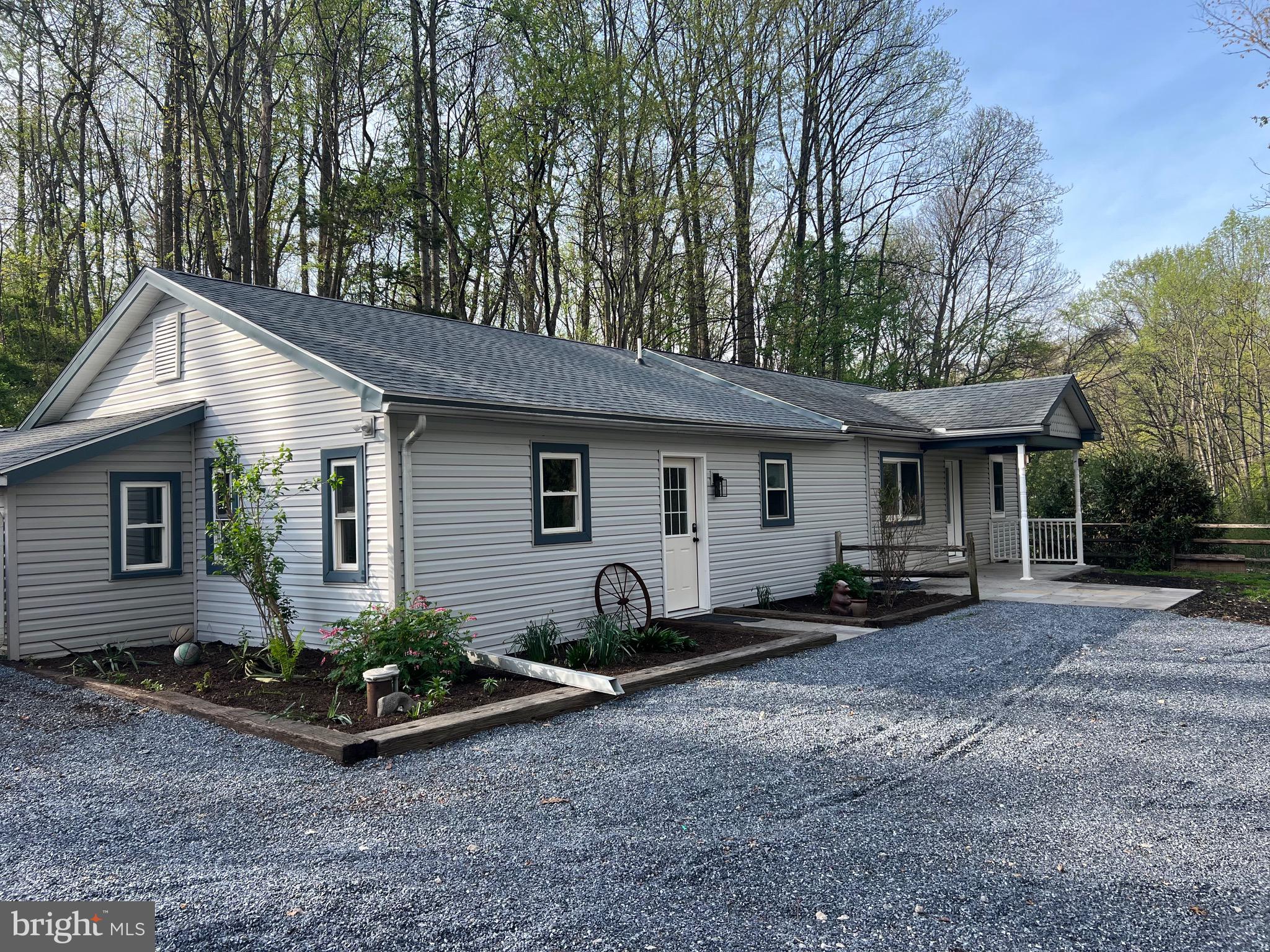 Nestled on a serene, wooded lot, this newly remodeled ranch home offers the perfect blend of rustic  and modern feels.   The spacious floor plan, this 3-bedroom, 2-full bath home is designed for both comfortable daily living and effortless entertaining.  Don't miss out on the opportunity to own a home that is away from city life, where is quiet with nature and woods!