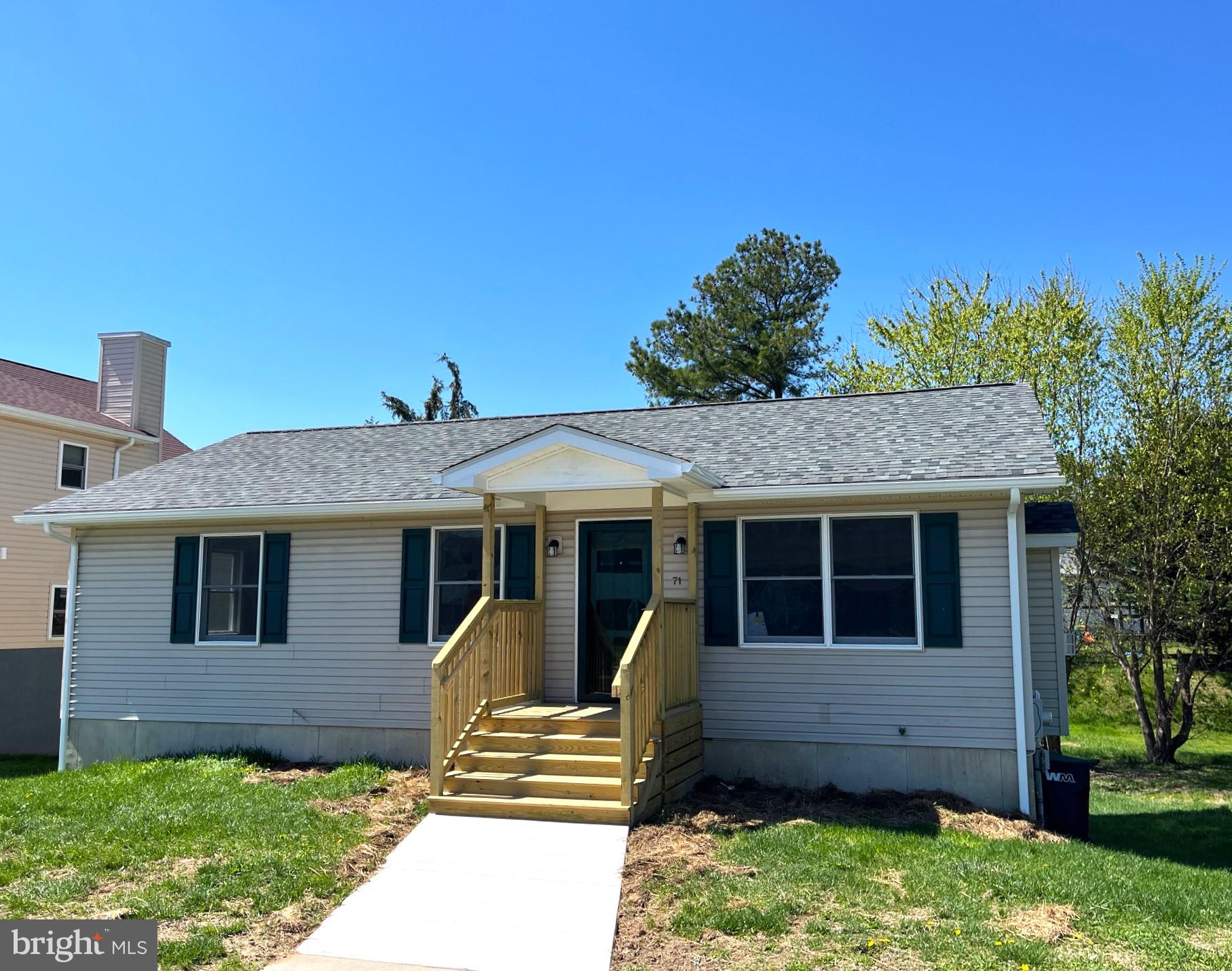 Welcome to 71 Harkins Drive in beautiful Smyrna, Delaware.  This completely renovated ranch home features 3 bedrooms, 1 full and 1 half bathroom, and encompasses 1,040 square feet of living space. It's situated on a large open lot in a peaceful cul-de-sac.  The home's layout includes a living room with a gas fireplace that was recently cleaned and serviced, creating a warm and cozy atmosphere. Adjacent to the living area is a dining space that provides access to an updated deck, overlooking the spacious rear lawn. This outdoor area offers a serene spot to relax and enjoy the natural surroundings.  The renovation included a lot of NEW items including a NEW Roof, NEW Gutters, NEW HVAC System, NEW Front porch, NEW Concrete walkway, NEW fresh paint, NEW LVP Flooring, NEW sinks and NEW toilets in both bathrooms, NEW Kitchen Cabinets, NEW Countertops, NEW Dishwasher, NEW Oven, NEW Microwave, NEW Light fixtures and NEW Door Knobs and Hinges.  The basement has an egress door so it'll be a snap to finish the huge basement any way you'd like to.  Conveniently located just an hour from the beach and close to restaurants, shopping, recreation, entertainment, health care, and Rt 1.  With all of this wonderful NEWNESS, this fantastic home won't last very long!!!