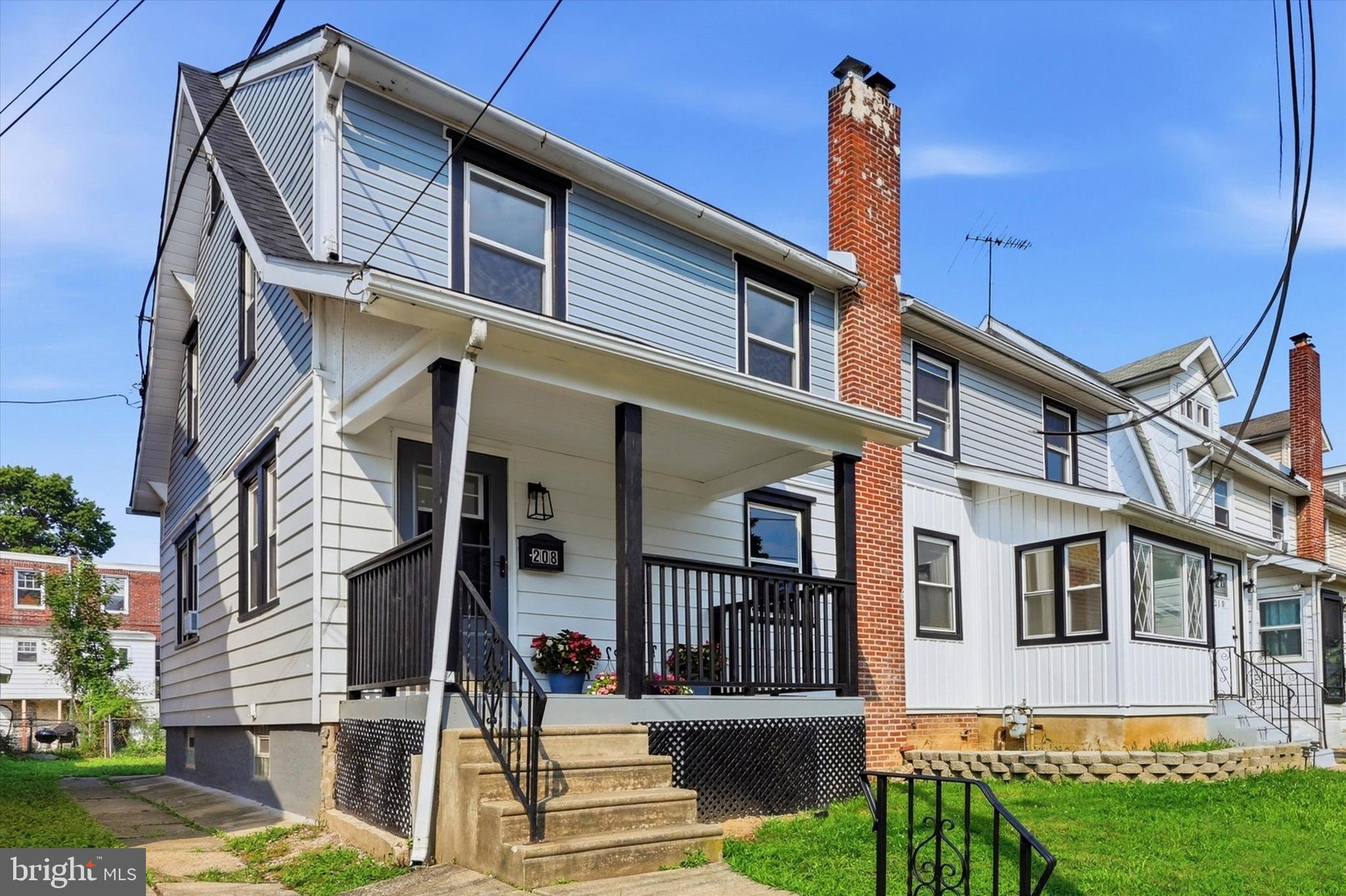Welcome to 208 Marshall Avenue! This beautifully renovated twin is move-in ready. Relax on the inviting covered front porch before stepping inside to a bright and spacious living room featuring refinished hardwood floors, recessed lighting, and charming exposed brick accents.

The updated kitchen showcases white cabinetry, sleek countertops, stainless steel appliances, and a functional layout that flows into the dining area—perfect for everyday living and entertaining.

Upstairs you’ll find three comfortable bedrooms and a beautifully updated full bathroom, while the finished attic provides the perfect bonus space for a fourth bedroom, home office, playroom, or guest suite. The finished basement adds even more living space, making it ideal for a family room, gym, or media room.

This home has been thoughtfully updated with a new roof, updated electrical system, new hot water heater, renovated kitchen and bathrooms, refinished hardwood floors, and fresh finishes throughout, allowing you to move right in with peace of mind.

Step outside to enjoy the large fenced backyard with plenty of room for entertaining, gardening, pets, or play. Conveniently located near shopping, dining, schools, parks, and major roadways.

Don’t miss your opportunity to make 208 Marshall Avenue your new home!