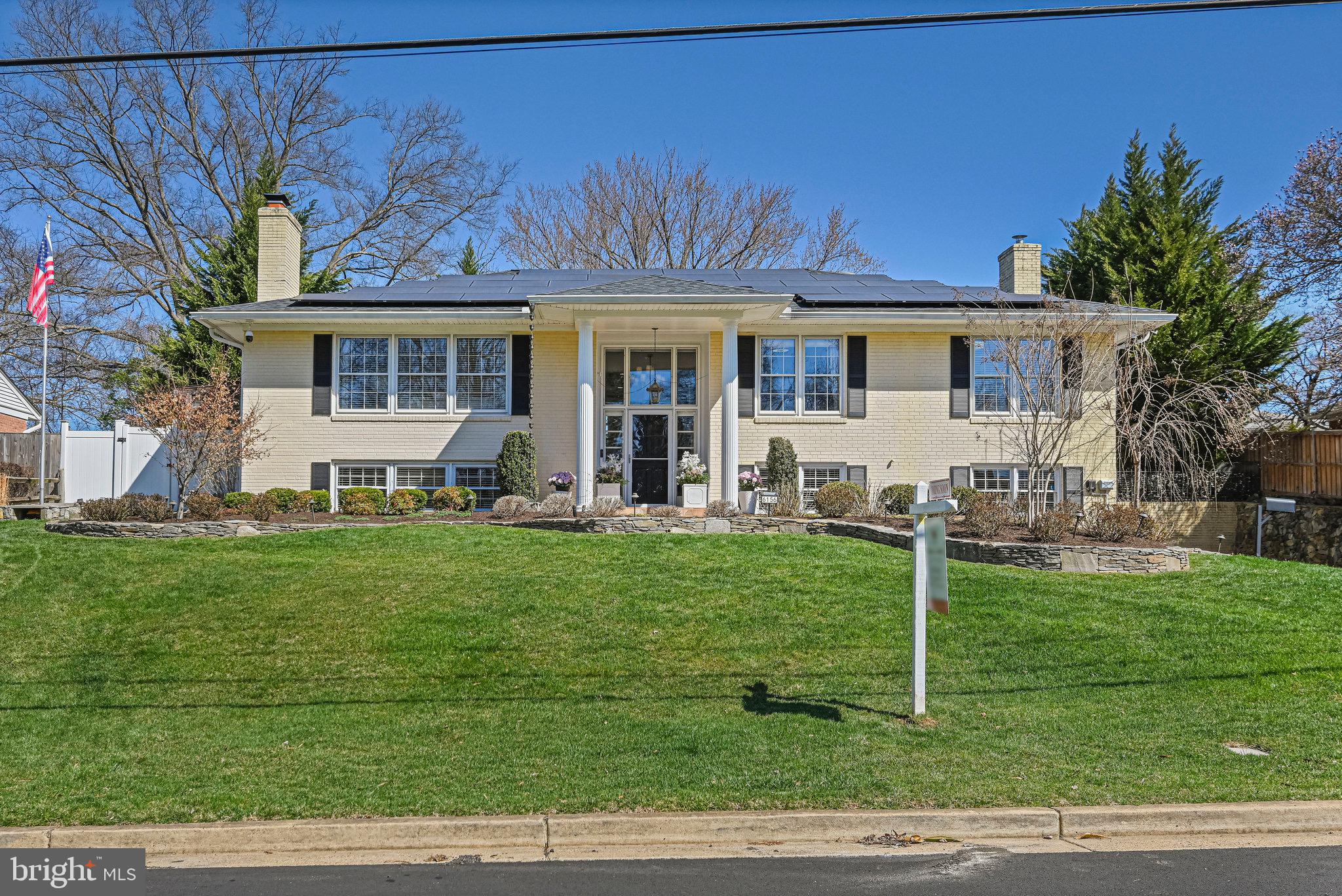 Introducing 6156 Loch Raven Dr, McLean, VA – A Harmonious Blend of Modern Luxury and Entertainment. Nestled in the highly desirable Potomac Hills community, this beautifully updated 4-bedroom, 3-bathroom home with an amazing backyard pool combines style and function, with a vacation feel. The home features hardwood floors throughout and a sleek, updated gourmet kitchen with granite countertops, perfect for modern living. The open-concept kitchen, dining, and living spaces create a welcoming, flowing environment, while built-in shelves and a wood-burning fireplace add a cozy touch. The main level includes 3 of the 4 bedrooms, highlighted by the primary suite with an ensuite bath featuring heated floors for added comfort. Additional luxurious touches include a steam shower and heated floors in the downstairs bathroom. The personalized 2-car garage doubles as a Craftsman’s workshop, ideal for winter projects or hobby work. The lower level adds even more value with a 4th bedroom and a 3rd full bath. The recreation room, complete with a second wood-burning fireplace, offers a cozy space for relaxation and entertaining.  Outside the home, is an entertainer’s dream. The expansive backyard boasts a striking 11.5 ft deep pool with a diving board, complemented by a fully equipped outdoor bar perfect for hosting. An outdoor TV and surround sound system with speakers set the stage for unforgettable gatherings. With complete privacy provided by the surrounding evergreens and the elevated lot’s natural protection, the backyard is a serene oasis. The Potomac Hills community is celebrated for its welcoming, neighborly atmosphere, offering a sense of connection and is super convenient to Washington DC, Tysons, downtown McLean, Falls Church, the Beltway, and GW Parkway. This home perfectly balances luxurious living and outdoor entertainment in a peaceful, vibrant neighborhood. Come live the good life.