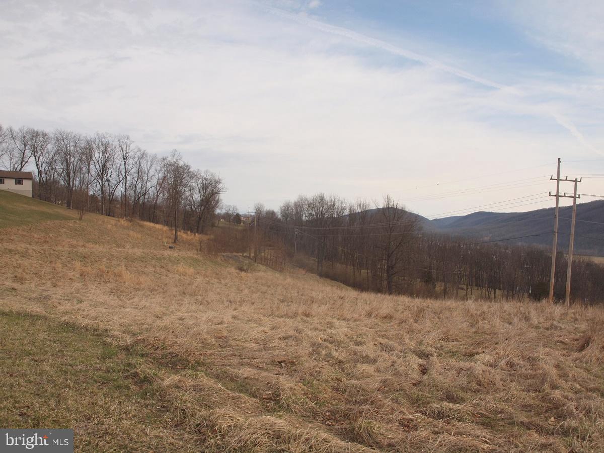 Don't miss out on this Great Buy! Plenty of room to spread out on this 8 Acre parcel of land located in Franklin Airport Development. Made up of 3 lots with Town Water, Sewer, High Speed Internet & Electric available.  Approved for stick built or modulars. No mobile homes. Some Covenants & Restrictions apply. 

Lots may also be purchase separately: 
Lot 10- 2.98 Ac, $29,000.00
Lot 11- 2.102 Ac, $22,000.00
Lot 12-2.967 Ac, $29,000.00

Listing agent is also one of the owners of this property.