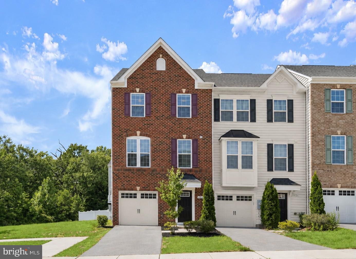Welcome to 4926 Arborgate Circle, a beautifully maintained end-of-group garage townhome nestled in the desirable community of Highgate Village. Showcasing luxury vinyl plank flooring and a fresh neutral color palette, this inviting home offers a spacious, thoughtfully designed layout across three finished levels. The entry level features a welcoming foyer that flows into the family room with direct walkout access, along with a convenient powder room and interior access to the garage. The upper main level is ideal for everyday living and entertaining, featuring a bright living room and an eat-in kitchen equipped with granite countertops, ample cabinetry, a center island with breakfast bar seating, pendant lighting, and sleek appliances. The adjoining dining area provides direct access to the deck, while an additional powder room completes this level. Upstairs, the serene primary suite features a tray ceiling, walk-in closet, and private en-suite full bath. Two additional bedrooms, a second full bath, and a conveniently located laundry room complete the top level.

Highgate Village offers an ideal location with convenient access to shopping, dining, and everyday conveniences in Arbutus, Catonsville, and nearby Baltimore Crossroads. Outdoor enthusiasts will appreciate nearby Patapsco Valley State Park, while UMBC, Guinness Open Gate Brewery, and BWI Airport are just minutes away. Commuters enjoy quick access to I-95, I-695, MD-295, Route 1, and the Halethorpe and St. Denis MARC stations, providing easy travel to downtown Baltimore, Washington, D.C., Fort Meade, and surrounding employment centers.
Some photos have been virtually staged.