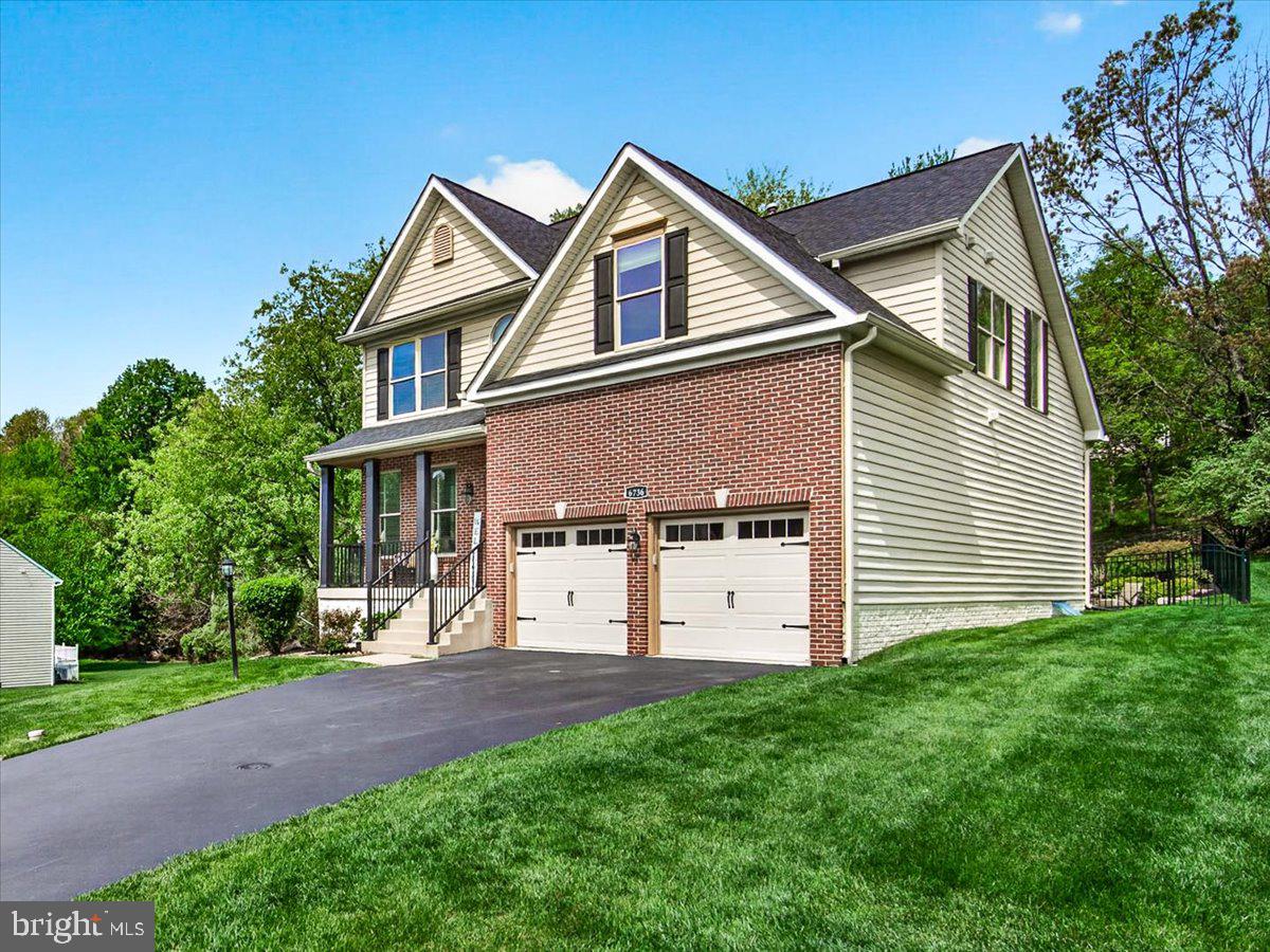 Lake Linganore Woodridge -- Assumable Loan at 2.625 == Modern Luxury Meets Functional Living - Welcome to your new home! This stunning, fully remodeled residence offers the perfect blend of modern luxury and practical functionality. Boasting four spacious
bedrooms—with the flexibility to convert the lower level into a fifth bedroom—this home is thoughtfully designed to accommodate your lifestyle. With three and a half beautifully updated bathrooms, every detail has been considered for your comfort and convenience.   Step inside to enjoy an open-concept floor plan adorned with premium finishes throughout. The inviting kitchen features sleek countertops, contemporary cabinetry, and state-of-the-art appliances—perfect for both entertaining guests and enjoying family
meals. A breakfast bar provides additional seating, while the bright breakfast room opens directly to the deck, seamlessly blending indoor and outdoor living. For pet lovers, a dog door leads to the backyard, which is safely enclosed with a fence to give your furry friends freedom and security.  The family room is a true centerpiece, showcasing a full stone, gas fireplace and an airy open design that extends to the upper level above, creating a warm and inviting atmosphere ideal for gatherings and relaxation.  Retreat to the primary suite, a private sanctuary offering a luxurious en-suite bath complete with a walk-in shower, a soaking tub, and dual vanities. Three additional bedrooms provide ample space for family, guests, or a home office, while a conveniently located half bath near the living area ensures added comfort for visitors.
Enjoy the outdoors with a beautifully landscaped yard, ideal for relaxation or entertaining. The home features both a spacious deck and a hardscaped patio crafted from natural materials, offering versatile spaces for gatherings or quiet moments. This remarkable home is equipped with an electric vehicle (EV) charger, providing the ultimate convenience for homeowners with current or future electric vehicles. Enjoy the ease of charging your car at home, ensuring you are always ready for your daily commute or any adventure. The inclusion of this feature highlights the homes commitment to modern living and sustainability, making it an even more attractive choice for todays discerning buyer.  Ideally situated in a desirable neighborhood close to schools, shopping, and parks, this move-in ready, remodeled gem provides everything you need for comfortable and stylish living. Don’t miss the opportunity to make this exceptional home yours!  Residents of Lake Linganore enjoy an incredible array of amenities: private lake and beach access for swimming, boating, and fishing; scenic walking and hiking trails; multiple swimming pools; playgrounds and tot lots; and a vibrant calendar of events including farmers markets and concerts throughout the year.