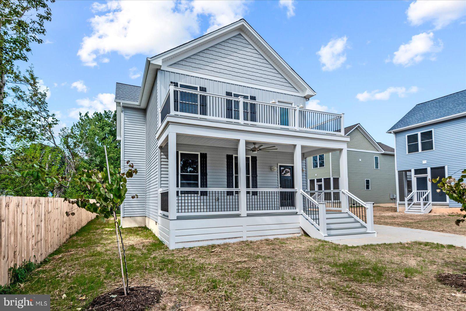 Welcome to this exceptional new construction home, perfectly sited  lot just blocks from the river. Blending timeless architecture with modern design, this residence offers the best of Colonial Beach living.
A classic front porch invites you inside, where the main level unfolds in an airy, open layout. The gourmet kitchen—with a breakfast island, walk-in pantry, and seamless flow to the living and dining rooms—sets the stage for gatherings both large and small. A flexible main-level bedroom and a screened-in covered back porch extend comfort and convenience.
Upstairs, the primary suite is a true sanctuary. Enjoy a private balcony, expansive walk-in closet, and a spa-inspired en suite bath featuring a walk-in shower with soaking tub, and designer finishes. Two additional bedrooms, a full bath, and upstairs laundry connections complete the thoughtful floor plan.
With covered porches, generous living spaces, and a location just moments from the Potomac, this home is a rare opportunity to enjoy modern coastal living in the heart of Colonial Beach.