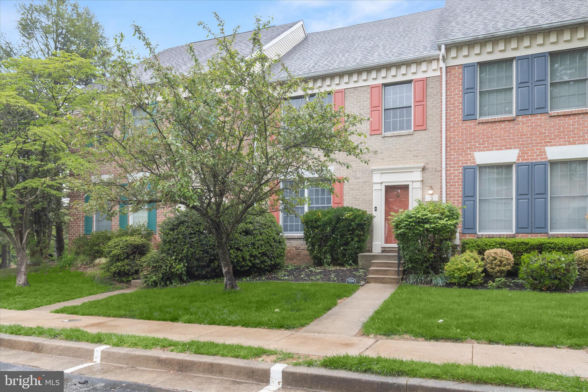 Welcome to this three-level townhome offering three bedrooms with three-full and one-half bathrooms in the desirable Chapel Gate neighborhood in Mays Chapel. As you enter, a neutral color palette and hardwood floors that extend throughout the main level create a warm and inviting atmosphere. The eat-in kitchen features granite counters, a beadboard backsplash, recessed lighting, a pantry, and space for a breakfast table. Open-concept living and dining areas provide ample room for gatherings, with crown moldings and sliding glass doors leading to the deck. A half bathroom completes this level. Upstairs showcases recently replaced hardwood floors. The primary bedroom suite boasts a vaulted ceiling, two closets, one of which is a walk-in, and a luxurious en-suite bathroom with a frameless walk-in shower and dual-sink vanity. Two additional bedrooms share an updated bathroom with a tiled tub shower. A laundry closet with a full-size stacked washer and dryer adds tremendous convenience upstairs. The finished lower level expands the living space with a spacious recreation room that has a wood-burning fireplace and sliders opening to the rear patio and backyard. A versatile bonus room, complete with a walk-in closet and an adjacent full bathroom with a glass-enclosed walk-in shower, offers potential as an additional bedroom. A large storage room and a utility room with a second washer and dryer set provide extra functionality. Additional highlights include updated bathrooms and dual-zoned heating and cooling systems. Conveniently located just minutes from shopping, dining, and everyday amenities, with quick access to major commuter routes 83 and 695. Some images have been virtually staged.
