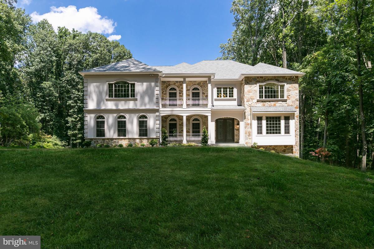 Brand new custom home by Sunfire Custom Homes  MHBR#7357- Move Right In! Features far too numerous to list include: finest finishes, hardwoods,10' ceilings (both levels), chefs kitchen,stone FP wall w/built-in TV in FR, detailed millwork, solid drs, home automation. Fully finished LL (2,500 sq. ft.). Huge deck leads to pressed concrete patio, large private yard.  Buyer pays all rec & ttax.