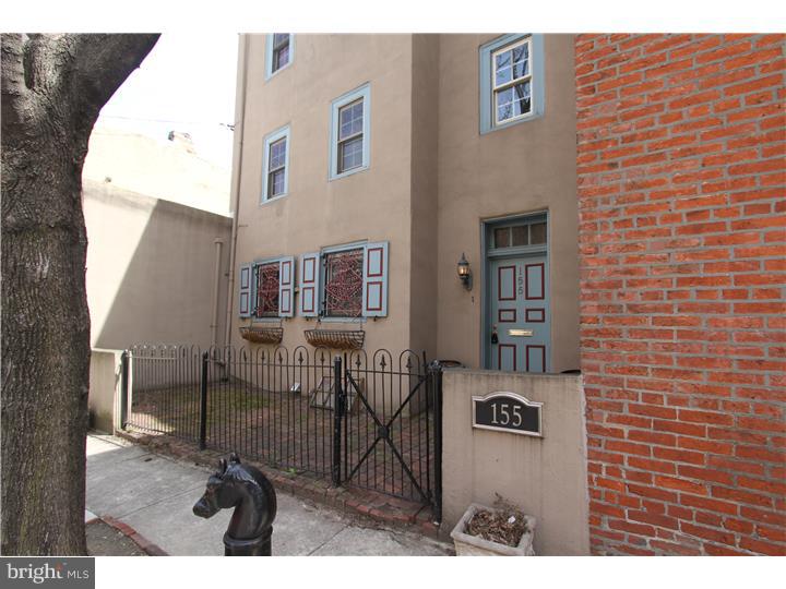 This turn of the century Corner 3 bedroom 2 full bath with 2,456 square feet is a rare opportunity in Northern Liberties. With original features such as 6 wood burning fireplaces and the potential to build a 2 story addition over the private garage equates to amazing potential for a prospective home owner. This 3 story home has curb appeal with original shutters, a brick front gated courtyard and yes a 12x22 foot garage! Enter in through the gated courtyard to an open foyer. To the left is a large kitchen with access to the garage. To the right through stained glass French doors is a large living room with decorative mantle and built in wood burning cast iron insert. Access to the huge finished basement from the foyer. The basement is completely tiled, includes washer and dryer and has plenty of counter height closets and sink. The is a large hearth fire place in basement as well. From the foyer the solid wood stairs with decorative iron detail leads to the 2nd floor. There are to bedrooms each with fireplaces and a hall bath. The bath features decorative tile floors, a storage vanity with vessel sink and a shower. The 3rd floor Master suit is enormous with a large bedroom, a fire place, 2 closets (skylight access from the closet on the left) a hall storage closet and a master bath with soaring ceilings. The bathroom includes a corner soaking tub, glass block shower, and a fireplace. There is central air, gas heating and cooking, and forced hot air heat. Located close to Jerry's Bar, Heritage Jazz Club, & the Piazza . (Bonus: This home has potential for immediate construction of a 528 sq. ft. addition on top of garage)