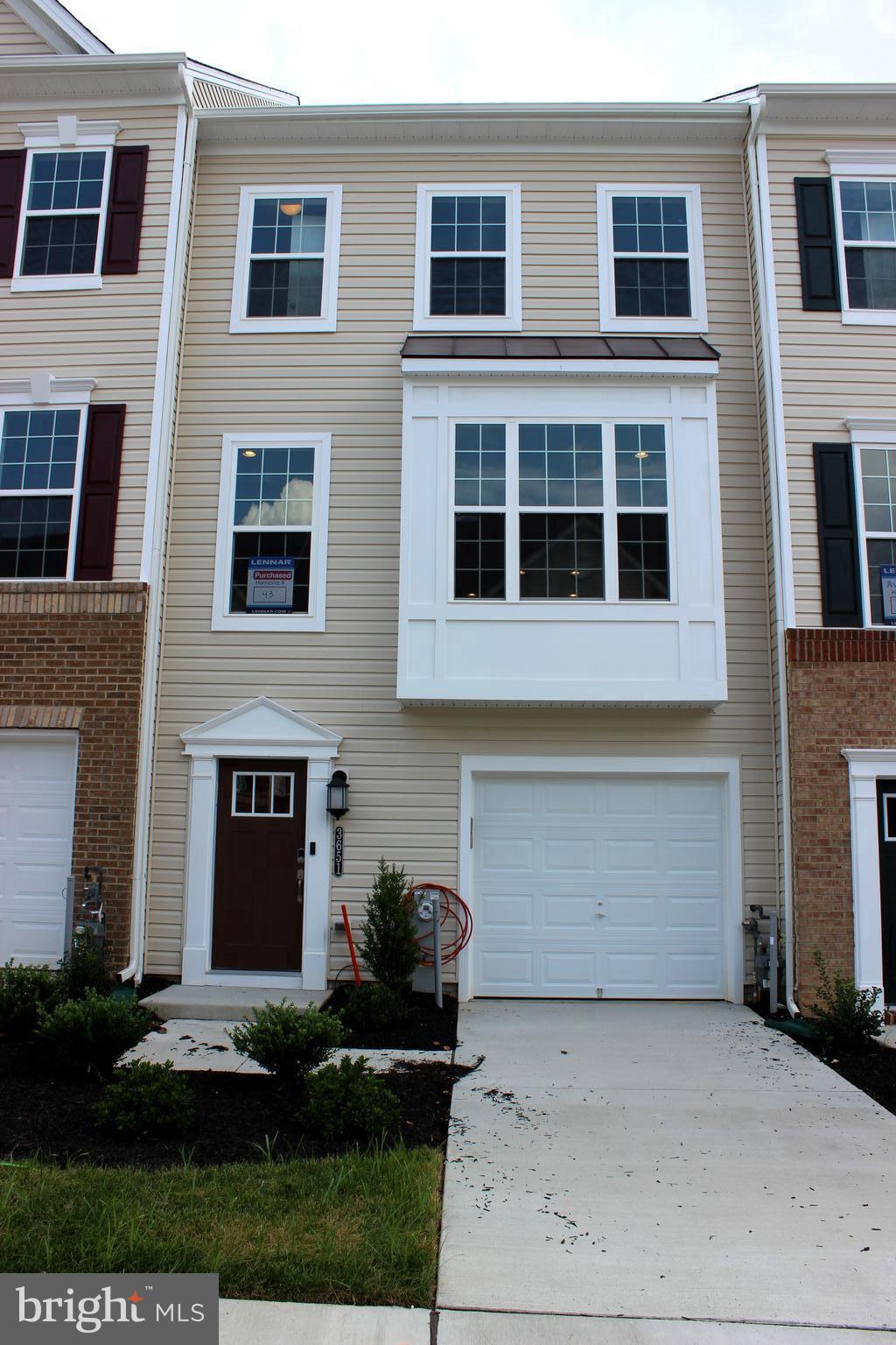 Rare find Move-in Ready NOW!!!New Paint and professionally cleaned.  This home is waiting for its new tenants who want to call this their home. Over 2,050 Sq ft with top-of-line upgrades throughout. 3 Bedroom, 2 Full and 2 Bathrooms, recreation room, one car garage and much more. The main level consists of an open floor plan with a huge gourmet kitchen and top-of-line black cabinets, Stainless steel appliances with gas cooking, and a huge center island. Hardwood floors on the main level lead to a Trex maintenance-free deck, tons of natural light, and an open-to-tree area. Great privacy and is ideal for entertaining. The top level consists of 3 bedrooms and updated vanities with granite counters, tiles, and walk-in closet. Huge rec room with walkout basement and deck that back to woods. The landlord looking for a good rental history, Good income, and good credit. Call ahead for more questions and before applying.