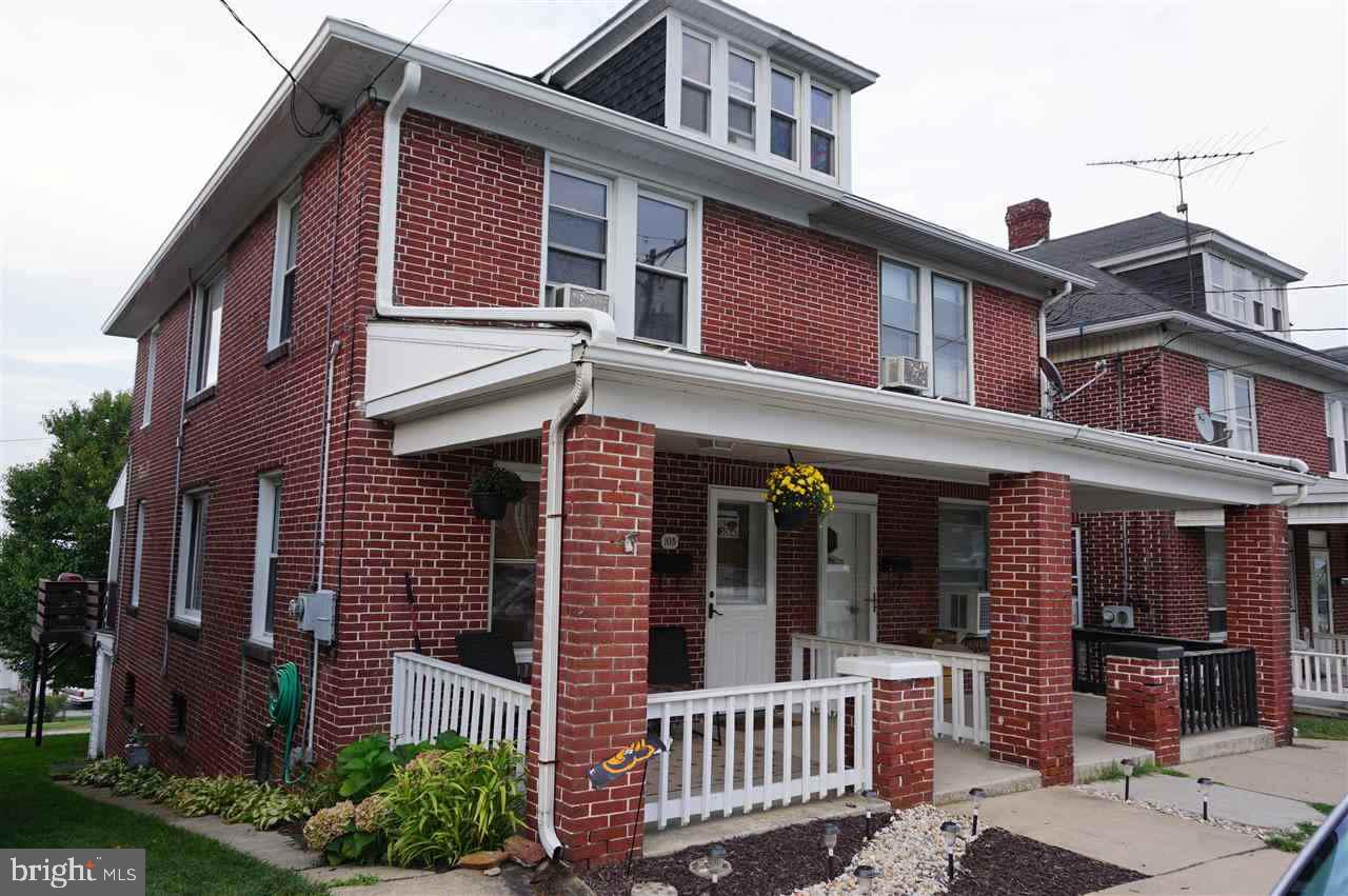 Welcome Home!  Move right into this affordable-updated brick 3BR home.  New laminate flooring, new roof 9/14, tilt replacement windows, remodeled KIT/BA, 1st flr LAU, great rear deck & off-street parking.  Possibility of 4th BR in finished attic.  Conveniently located near Red Lion Park/splash park & library.  Close to schools, shopping & all the conveniences!
