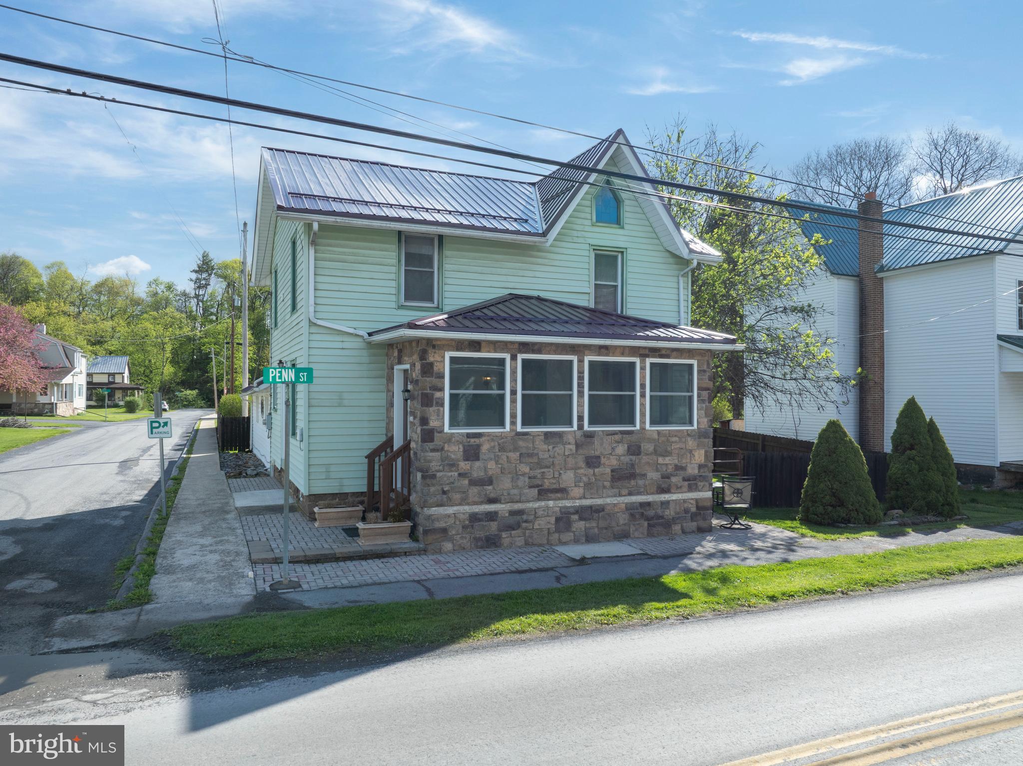 This charming two story home is in the heart of Milheim, offering a convenient commute to State College, Centre Hall and Bellefonte. The flat .17 acre fenced parcel provides ample parking along with exceptional outdoor storage or workspace in the 23’x12’ shed. The yard provides plenty of room to run around or to set up a cozy firepit or plant the garden of your dreams. Inside you will appreciate lots of recent updates like the durable metal roof, efficient mini-split heating system and recently finished mudroom/laundry room space with brick flooring. Enjoy gathering up in the large living room or the sizeable rec room or preparing meals in the eat-in kitchen. A handy powder room with newer barn door rounds out the main level. Upstairs, each of the three bedrooms have hardwood floors and the spacious full bath includes hookups for laundry should you want to move it upstairs. Find even more storage in the walk-up attic. Schedule your private tour today to make 149 Penn Street yours!