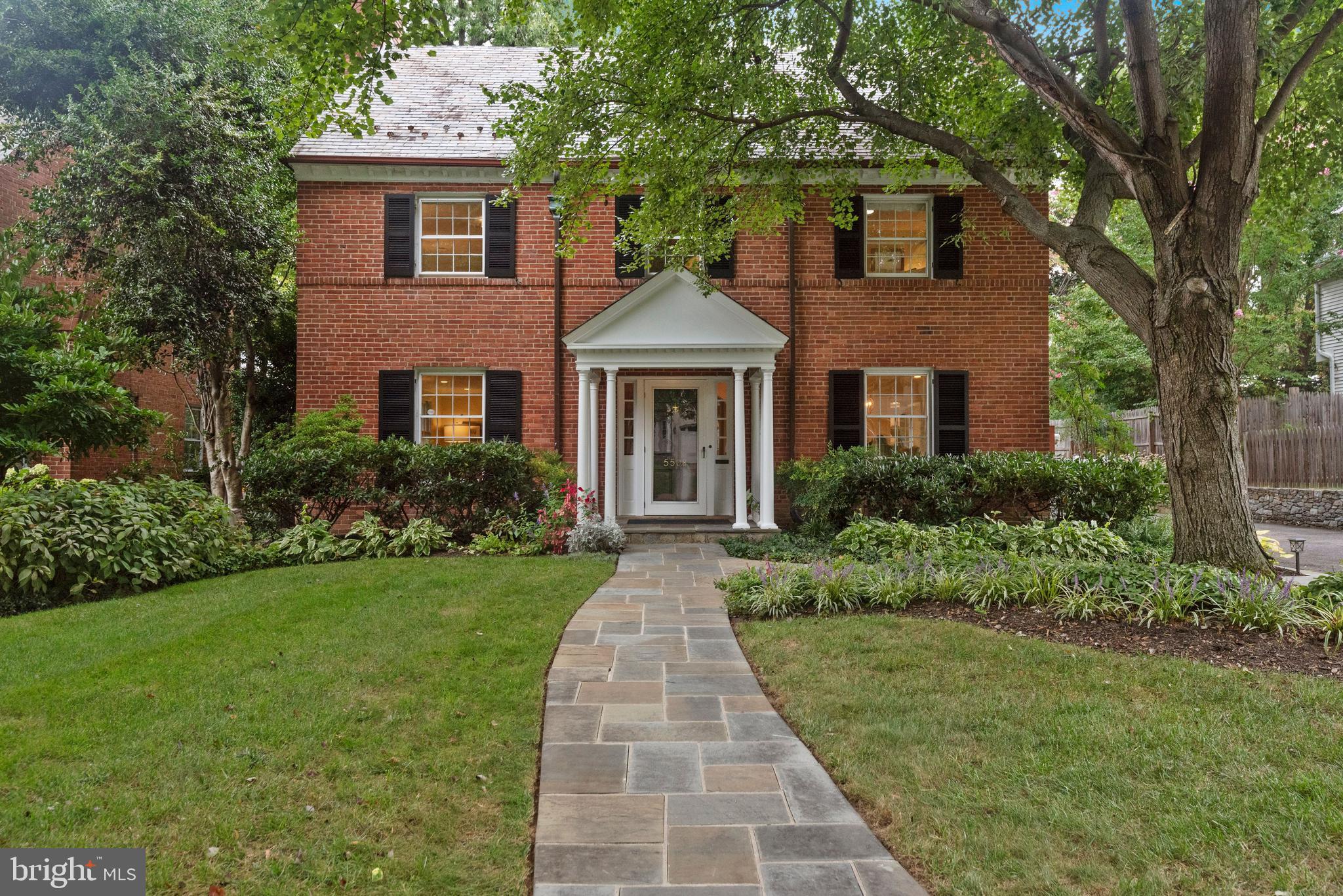 Fabulous classic center hall colonial in the heart of the west side of Chevy Chase Village and blocks to shopping, metro, restaurants and parks of Friendship Heights and Chevy Chase, DC! Built in 1940, this home has been expanded and lovingly cared for and maintained by the current owners, who are only the second owners of this house. With wonderful curb appeal, the home is filled with period details, including plentiful windows, beautiful floors, arched doorways, moldings, and more. The light-filled residence features rooms with a generous scale and a great flow and is set on a lovely level lot. With total square footage of approximately 4,900 square feet (3,850 finished), this home is perfect as it is, but also offers fabulous expansion possibilities in the existing footprint (both above the kitchen and breakfast room and into the unfinished third level) or outside of the existing footprint. The main level includes a center hall foyer, large living room with fireplace, separate dining room, spacious kitchen and breakfast room opening to large family room, and laundry. A large primary suite with walk-in closets, dressing room, and bath with soaking tub, separate shower, and dual vanity is found on the second level along with two additional bedrooms and a hall bath. The large, unfinished third level accessed by a stairway from the second-floor hallway is prime for conversion to an additional bedroom and/or office space! A recreation room with fireplace, fourth bedroom, and full bath, plus a work room and storage are found in the lower level. An extra-wide driveway provides parking for multiple cars, and the spacious yard, with its ample green space, is ideal for entertaining and play. In addition to numerous community events and activities, the Village has its own police department and post office, allowing residents to take advantage of many amenities, such as daily house checks for residents on vacation. So close to everything, this location is the perfect choice for those who desire a mature, established neighborhood with all of the conveniences of the city right at hand. Don't miss this amazing opportunity!