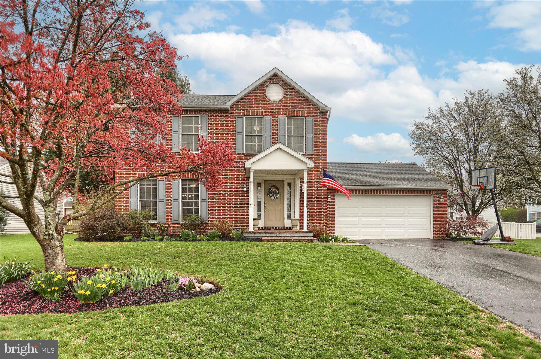 Nestled in a serene neighborhood near Carlisle Pike and the Borough of Mechanicsburg in the Cumberland Valley School District, this charming brick-front two-story home is a true gem. The property features a spacious, fenced rear yard with stunning landscaping, perfect for outdoor activities and relaxation. On the main level, you'll find a generous living room with large windows and a cozy corner wood-burning fireplace, ideal for creating a warm and inviting atmosphere. The dining room is adorned with elegant crown molding and chair rail, leading to a modern kitchen equipped with high-end stainless steel appliances (induction range) and a dining area that opens to a sunroom. The sunroom, with its cathedral ceiling, offers a beautiful view of the rear yard, making it a perfect spot for morning coffee or evening unwinding. A wide staircase leads to the second level, where you'll discover a primary bedroom with a beautifully updated bath and walk-in closet, providing a private retreat. Two additional bedrooms and a hall bath offer ample space for family or guests. The finished lower level is perfect for entertaining or family enjoyment, featuring a spacious family room, office space or multipurpose room, and a laundry/utility room. Don't miss the additional cabinetry for storage or pantry space as you head downstairs. Conveniently located close to dining, shopping, and major transportation, this home offers both comfort and accessibility. Plus, its proximity to schools and community parks adds to its appeal, making it an ideal location.
