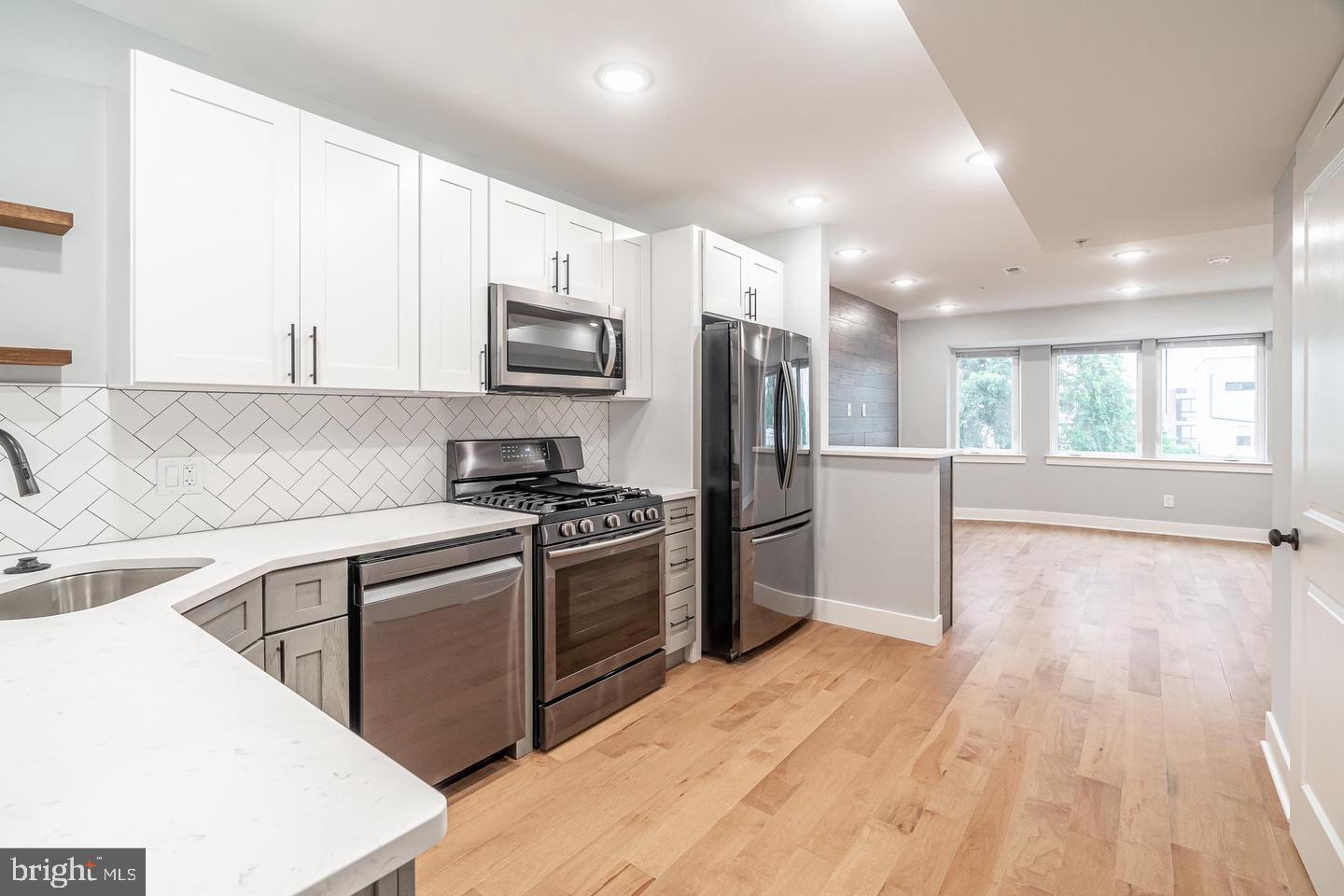 Fantastic NEWER CONSTRUCTION Unit Available For Rent in MID APRIL in Brewerytown! ONE MONTH RENT FREE for a 13 MONTH LEASE: ONLY $1,662 MONTHLY Net Effective Rent! This is a Big Modern 2 Bed, 2.5 Bath, 1,244 square foot unit with its own HUGE PRIVATE ROOF DECK featuring Great CITY VIEWS! Inside are Stunning Finishes, such as a Designer Open Kitchen, High-End Bathrooms, a Living Room with an electric Fireplace, Maple Hardwood Flooring, Recessed Lighting and Large Windows throughout! There is even an IN-UNIT WASHER DRYER and Doorbell Buzz-In System! SHOWINGS START TUESDAY MARCH 4. The Kitchen features white Quartz Countertops including a Peninsula, Herringbone subway Tile Backsplash, Stainless Steel Appliances, two-toned Shaker Cabinetry and a window. Adjacent to the kitchen is the Living Room featuring the Fireplace and Big Windows. This floor has a stylish, guest friendly Half Bathroom. The staircase and hallway lead to the Sizable Two Bedrooms, each with En-Suite High-End Bathrooms and Walk-In Closets. Each Bedroom Will Fit a King or Queen Size Bed (based on estimated room measurements). Across the street from Athletic Square Park, this property is located in one of Philly's most booming neighborhoods, with great restaurant, bar and shop attractions, fooderies, Fairmount Park and more within easy walking distance. It is only a 3 block walk from the main commercial corridor on Girard Ave, and near Aldi Supermarket on N 31st St. The building is close to major highways, public transit, other neighborhoods like Center City, Rittenhouse, Fairmount, and near Kelly Drive along the Schuylkill River. The Tenant(s) Will Pay Utilities for the unit: $50 flat water fee monthly, gas, electric, internet, TV. The building is pet-friendly! There is a one time non-refundable fee per pet: $400 for a dog, $250 for a cat. The application fee is $75 per adult, the listing agent will send the link. The first month's rent and a security deposit equal to two month's rent will be due after lease signing. The last month's rent is Not due up front. Act quickly before this unit is taken!