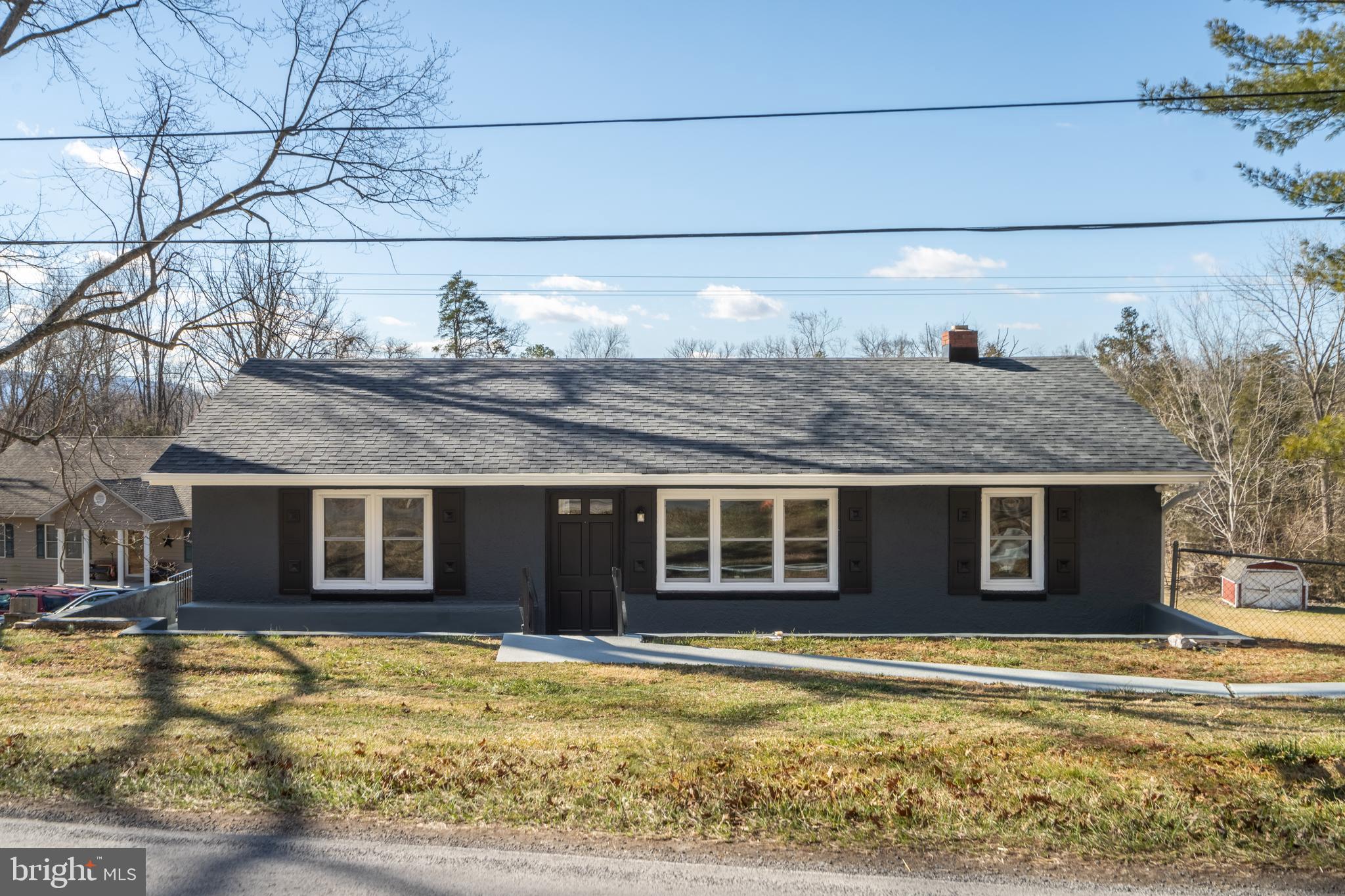 Renovated ranch-style home in a peaceful country setting, ready for its new owners! This charming 3-bedroom, 2-bath home has been beautifully restored, featuring updated kitchens and bathrooms. An additional lot expands the property to a total of 1.65 acres, offering plenty of space to enjoy. Picture yourself relaxing on the front porch with your morning coffee or tea. With no HOA and no restrictions, this home provides both comfort and freedom. A true gem inside and out!
