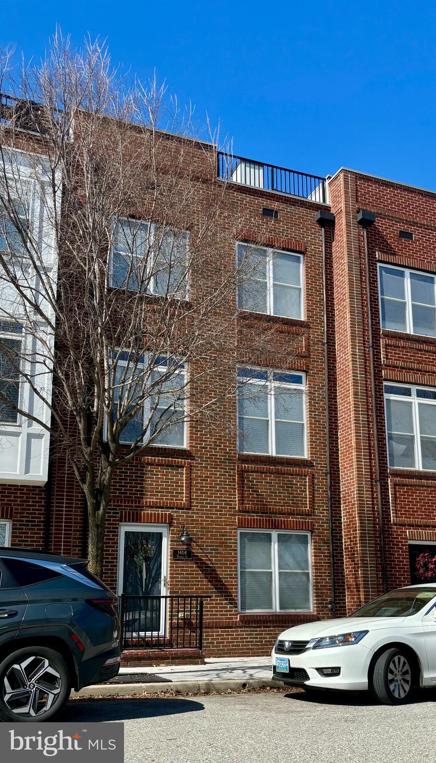Welcome to this beautiful 3 bedroom, 2 full bath, 2 half bath townhouse nestled in the desirable community of McHenry Pointe in Locust Point. This home is in pristine, move-in ready condition and boasts hardwood floors throughout. The entry level features an office/den (which could be converted into a fourth bedroom by adding doors), a half bath, a laundry room equipped with a washer and dryer, a new water heater (2024), and a spacious 2 car garage with ample storage shelving.
On the first floor, you'll find a dining room opening to a living room with lovely views of the community green space. The eat-in kitchen is outfitted with stainless steel appliances, granite countertops, and a gorgeous tile backsplash. The bedroom level offers a large primary suite with a walk-in 
closet and en suite bathroom, featuring a walk-in shower, soaking tub, and dual vanity. This floor also includes a hallway full bathroom, linen closet, and two additional bedrooms. The upper level is perfect for entertaining with a wet bar area and rooftop patio, providing fabulous city views and a new roof (2024).
This meticulously maintained home is minutes away from the Inner Harbor, Latrobe Park, local restaurants and entertainment, and offers easy access to I-95.
Come see this beautiful home and make it yours today!