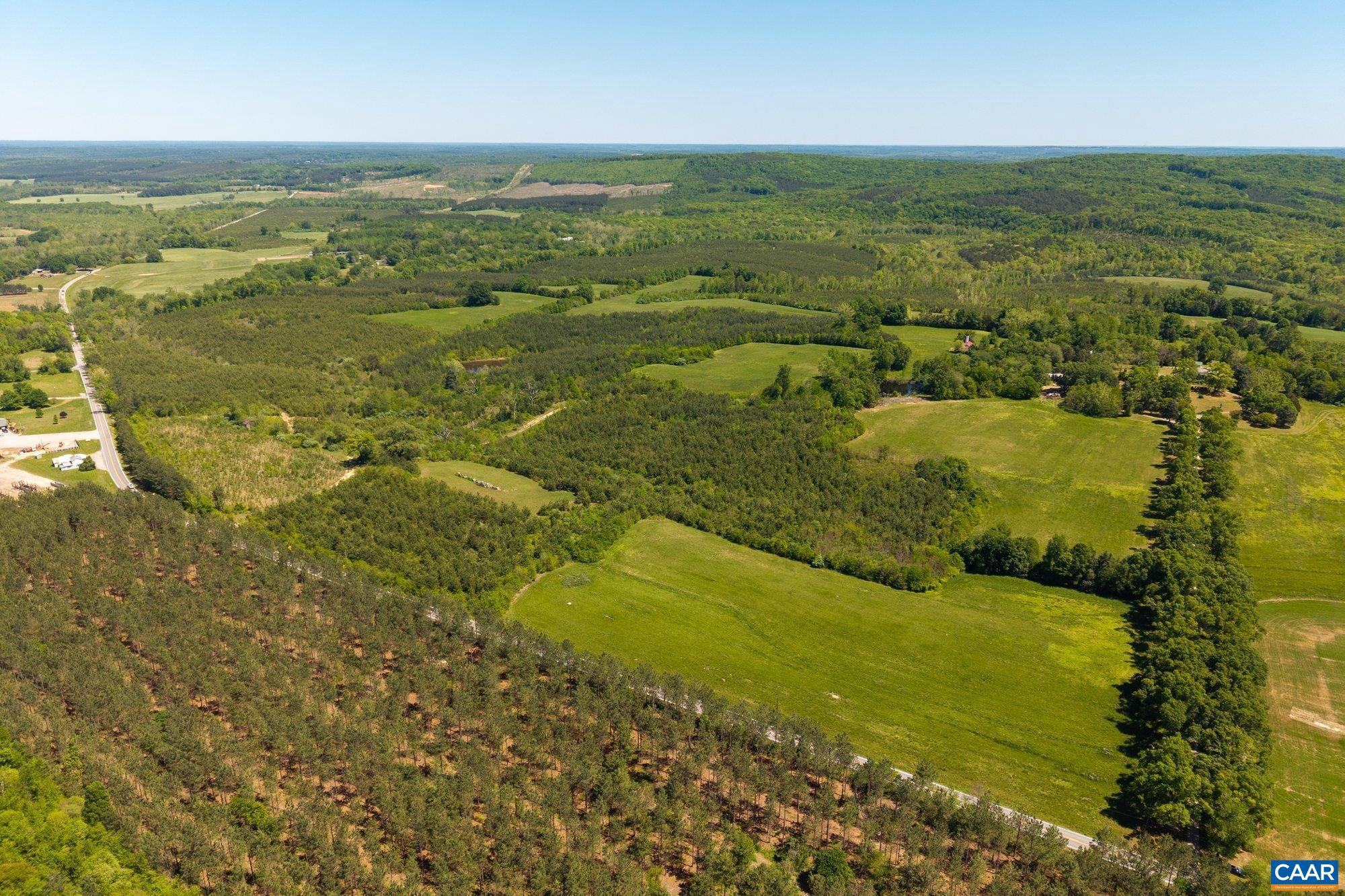 This approximately 228-acre parcel is part of the historic Whitehall estate at 400 Doe Lane and is offered subject to final survey. The land features a balanced mix of open pasture, mature woodland, and a scenic pond, creating an excellent setting for agricultural use, recreation, or a private rural retreat. Gently rolling terrain provides both visual appeal and practical usability, with several potential homesites across the property. The combination of open fields and wooded acreage supports wildlife habitat while offering flexibility for farming, hunting, or trail riding. Located in the quiet countryside of Pittsylvania County yet within convenient reach of Chatham and regional routes, this offering represents a substantial tract within the broader Whitehall estate.