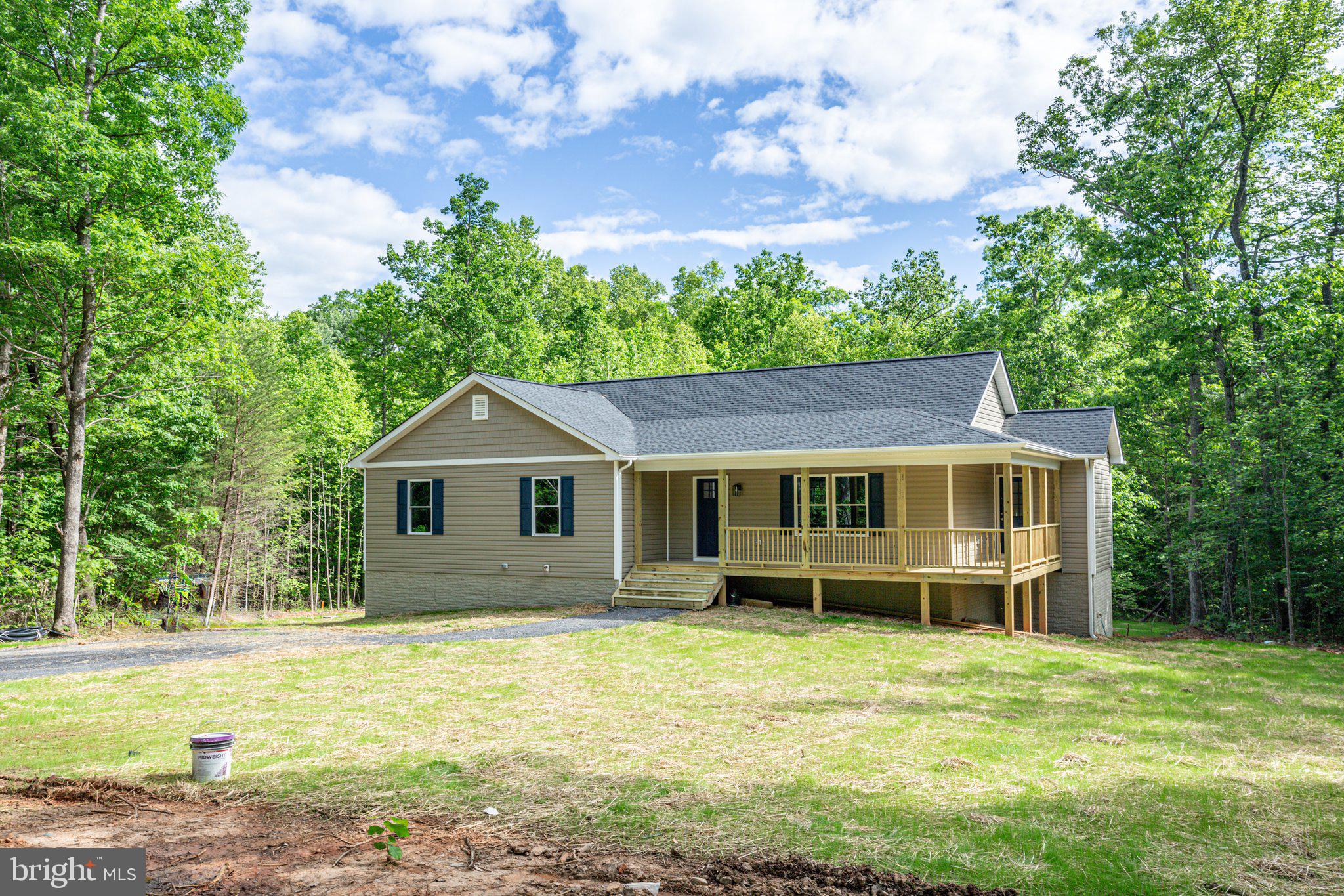 Welcome to this beautifully crafted one-story rambler, nestled on five peaceful acres. Featuring 3 spacious bedrooms and 3 baths, this home offers comfort and convenience at every turn. The partially finished basement adds an additional 800 square feet of finished living space and a full bath. 

Enjoy the outdoors with a relaxing front porch and a covered, screened-in 12x16 rear deck that’s ideal for entertaining or quiet evenings. With no HOA, you have the freedom to enjoy your property to the fullest. The peaceful, rural setting provides the perfect blend of privacy and space, all while being just a short drive from local amenities.