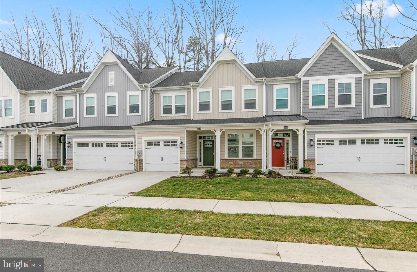 Discover this like-new 4-bedroom, 2.5-bath villa in the amenity-rich Villas at Walden community! Designed for modern living, the open floor plan showcases high-end LVP flooring, soaring ceilings that flood the space with natural light, and a gourmet kitchen equipped with stainless steel appliances, a large prep island, stylish backsplash, and pendant lighting. The first-level owner's suite, complete with an ensuite bath, offers the convenience of one-level living. Step outside to enjoy the serene rear patio, which overlooks a peaceful wooded backdrop. Upstairs, three additional bedrooms and a loft provide plenty of space to grow, relax, or entertain. With community amenities including pools, walking trails, athletic courts, and a central location in the Cape Henlopen School District, this move-in-ready home is a must-see!