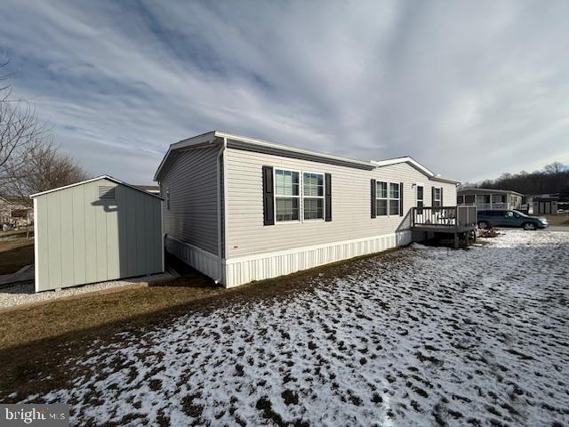 Beautifully maintained and far from your average manufactured home, this 3-bedroom, 2-bath residence was built in 2021 and offers a spacious open floor plan designed for comfort and convenience. The open kitchen features a generously sized island, ample counter space, an abundance of cabinets and flows seamlessly into the dining area and living room—perfect for everyday living and entertaining.  A laundry room is conveniently located just off the kitchen.

The spacious primary bedroom features an en-suite bathroom with extra cabinet space, a walk-in shower with grab bars, and a walk-in closet. The two additional bedrooms also include walk-in closets, offering plenty of storage space throughout the home. Thoughtfully designed for accessibility, the home includes a ramp for easy entry, and an additional shed provides even more storage. This move-in-ready home combines modern design, functionality, and comfort—truly a must-see.  Schedule your showing today!!