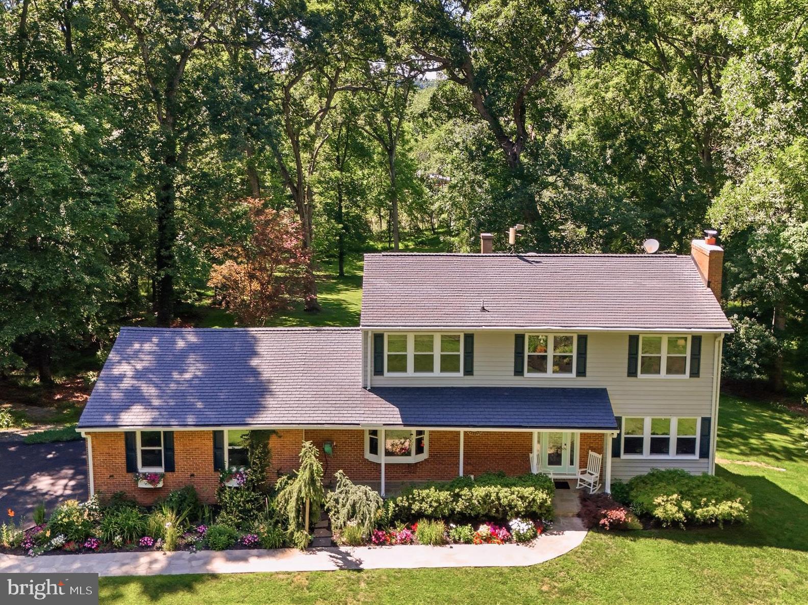 Space, quality, and thoughtful updates define this 6-bedroom, 5-bathroom home, tucked away on over 3 wooded acres. This property delivers the feel of quality construction with modern efficiency at every turn.

The kitchen features stainless-steel appliances and cherry craftsman cabinetry. Hardwood flooring runs throughout the upper level, and the fully finished basement — complete with 2 bedrooms and 2 bathrooms — is ideal for an in-law suite or separate living space.

Recent updates add both comfort and long-term value: a new dishwasher (2026), Osborn Matrix 2700 fireplace insert with heavy-duty stainless steel liner and pointed chimney (2026), Max Heat ACiQ heat pump (2025), LG 2-in-1 washer/dryer (2023), and triple-panel low-energy windows with tripton gas (2019). Save on utility bills as this home is also BGE Gold Certified through the Home Performance with ENERGY STAR program.

The attached 2-car garage features a polyaspartic floor coating and is fully insulated, ready for vehicles, a workshop, or hobby space. A new 12’x10’ shed was added in 2025, and the deck and covered porch provide outdoor living space perfect for entertaining. 

Conveniently located near MD-97, MD-144, and I-70, with easy access to state parks, Tridelphia Lake, and Cattail Creek Country Club. Located within the Howard County school district, recognized as one of the best in Maryland.