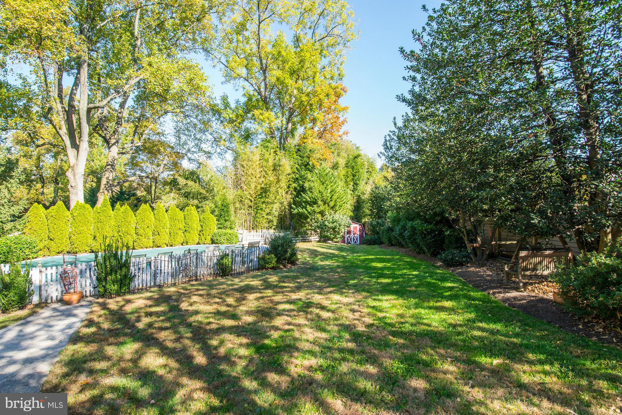 Beautiful level lot steps to the path to downtown Bethesda.  House needs work.