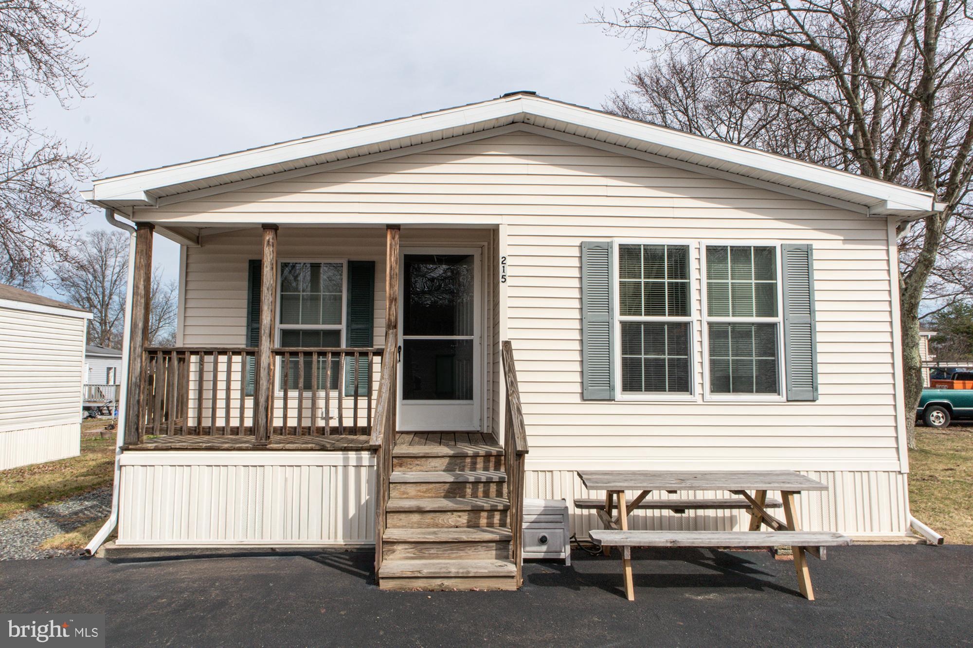 Never before offered in sought after Quakertown SD. This well maintained, Double Wide in affordable Richland Meadows, is ready to make your own.  Greeted by your covered front porch, Featuring  2 bedrooms and  2 full baths with owners suite. Plenty of natural light, the kitchen features  a center island with a separate dining room just off of the living room. Paved parking for 4 vehicles, a comfortable, well lit area in the evenings, a shed, central air and a washer and dryer are included with the unit. Water, sewer and trash are included in the park fee. Schedule your appointment today! Please do not walk the lot without an appointment.