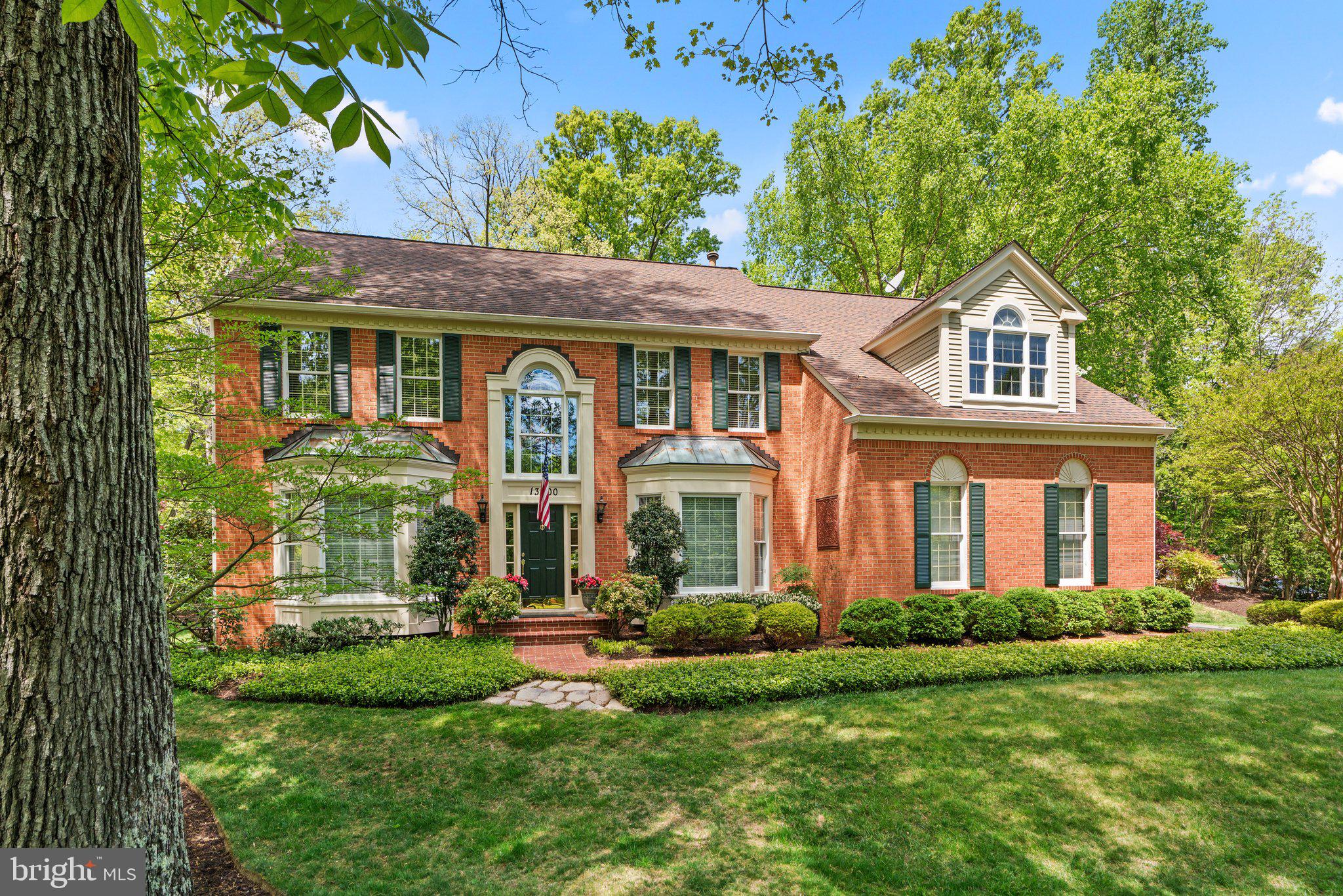 Welcome to this exquisite three-sided brick Pulte home, meticulously maintained and modernized without compromise, boasting 5 spacious bedrooms and 4.5 baths. Situated on a spectacular tranquil 1-acre lot featuring mature trees and specimen plantings, and a home generator in the sought-after Glen Hills community, this sun-filled home provides over 6200 square feet of finished living space. Upon entering the grand two-story foyer, you will be greeted by the open, bright, and spacious floor plan. The formal living room with hardwood floors, elegant moldings, and a bayed window opens to the formal dining room, leading to the custom-designed private screened-in porch. The state-of-the-art gourmet kitchen is a chef's dream, featuring Wellborn Elite Custom cabinetry with under cabinet lighting, quartz countertops, top-of-the-line stainless appliances including dual Bosch dishwashers, a six-burner gas Thermador cook-top, a commercial-grade Zephyr hood, KitchenAid double ovens, a side-by-side refrigerator with automatic water and ice dispenser, and a walk-in pantry offering ample space for entertaining. The kitchen is ideally located in the heart of the house and opens to the dramatic family room with walls of windows and a wood-burning fireplace with access to the screened-in porch. Guest quarters are tucked around the corner from the kitchen and are ideal for in-laws or out-of-town visitors. Enjoy working remotely from the quiet study with custom built-ins and tranquil views. The upper-level primary suite is a serene retreat, complete with a private office and a large bedroom area including two walk-in closets and a sitting area with a built-in window seat. The renovated spa-inspired primary bath features dual sinks with marble countertops, a separate shower stall with dual shower heads, body jets, shampoo niche, bench seating, and custom tile surround, water closet, soaking tub, dual linen closets, and porcelain floor. The upper level also encompasses three additional bedrooms and two beautifully renovated full bathrooms. The fully finished lower level is perfect for entertaining in the expansive recreation room or woodworking in the private workshop and includes two large storage areas and plumbing for a future bathroom. Glen Hills is one of Montgomery County's best-kept secrets! Conveniently located to shopping, schools, restaurants, major highways, and public transportation.
Schools: Fallsmead ES, Robert Frost MS, Thomas S. Wootton HS.