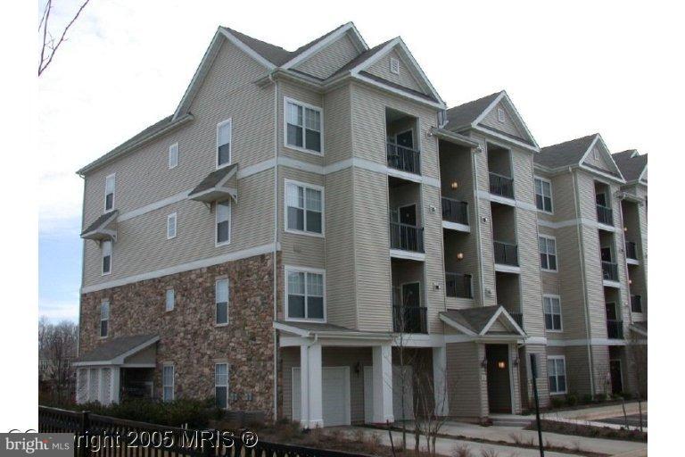 Lovely 1 BR in desired Stonegate! Great price incl's Pool & Fitness Center. 754 s.f., Gas Fireplace, Balcony, Middle Level, Reserved Parking Space # 376. Great location near Fair Lakes, Wegmans, Restaurants & more. Nearby Bus to Vienna Metro, Sorry no pets. Non-Smoking Environment inside. Avail July 1st